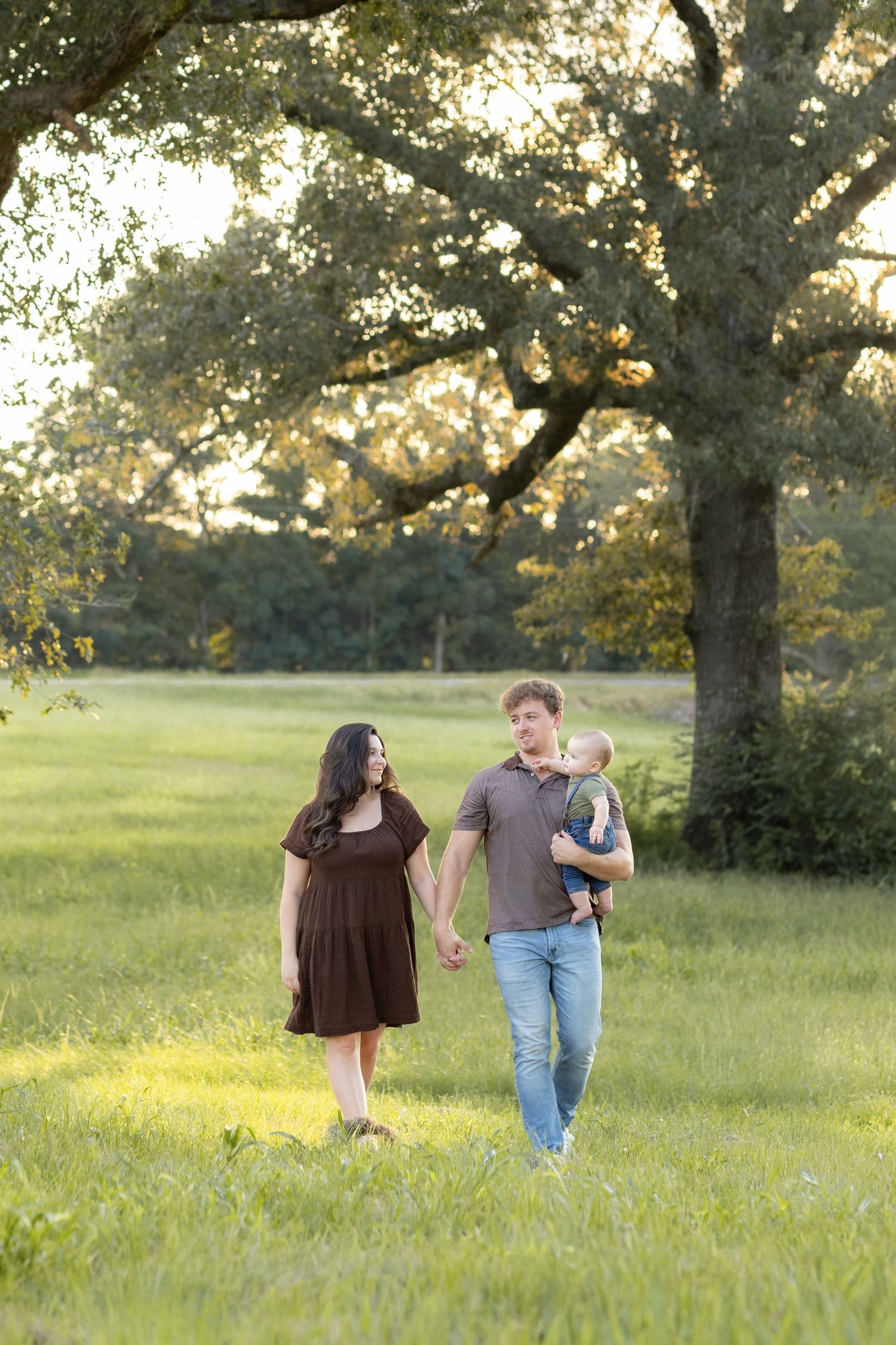 Family Pictures in a grass field at sunset near Dothan, Alabama