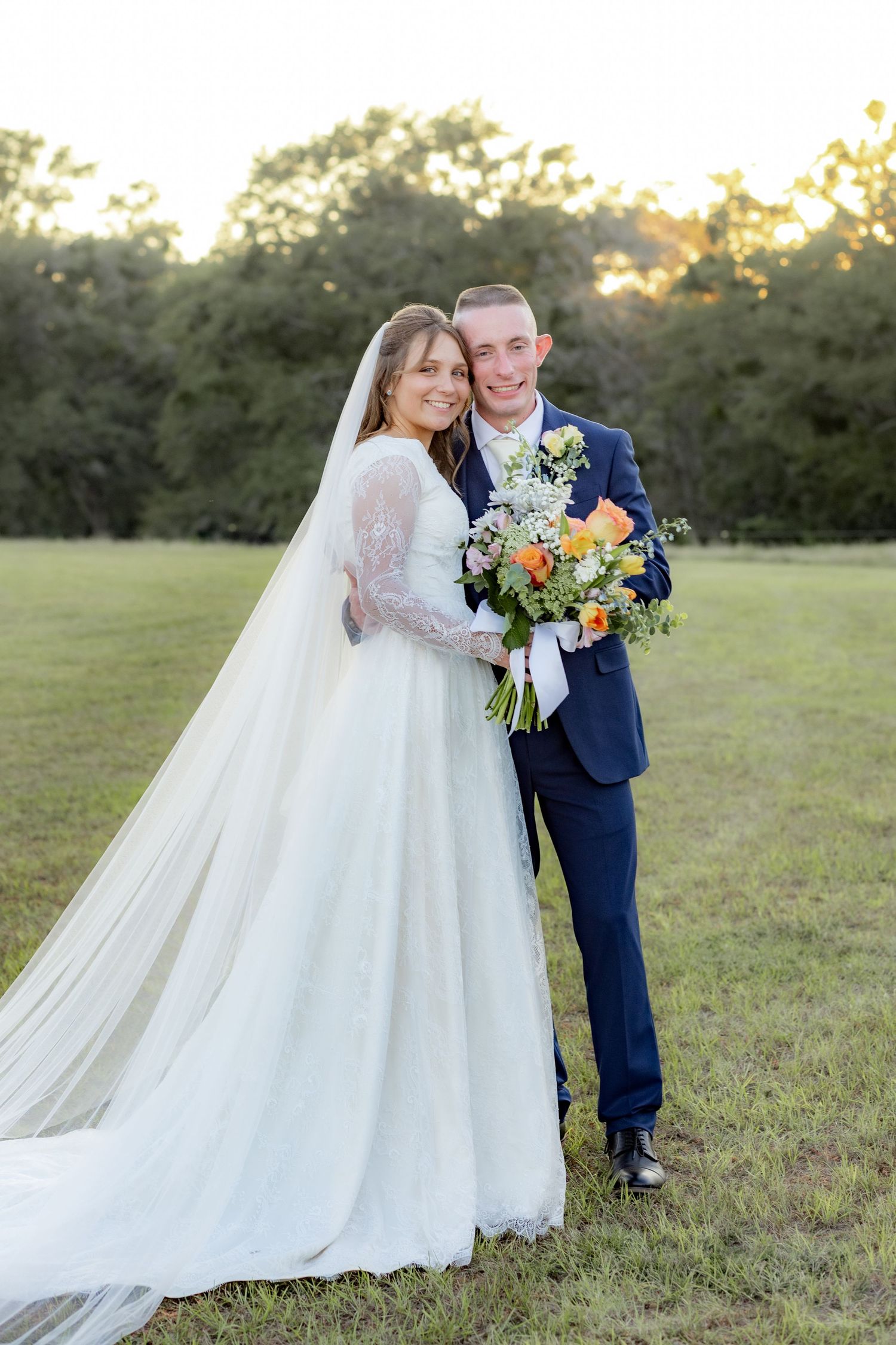 Bride and groom holding each other for portraits at Dalrymple Farms Enterprise, Alabama