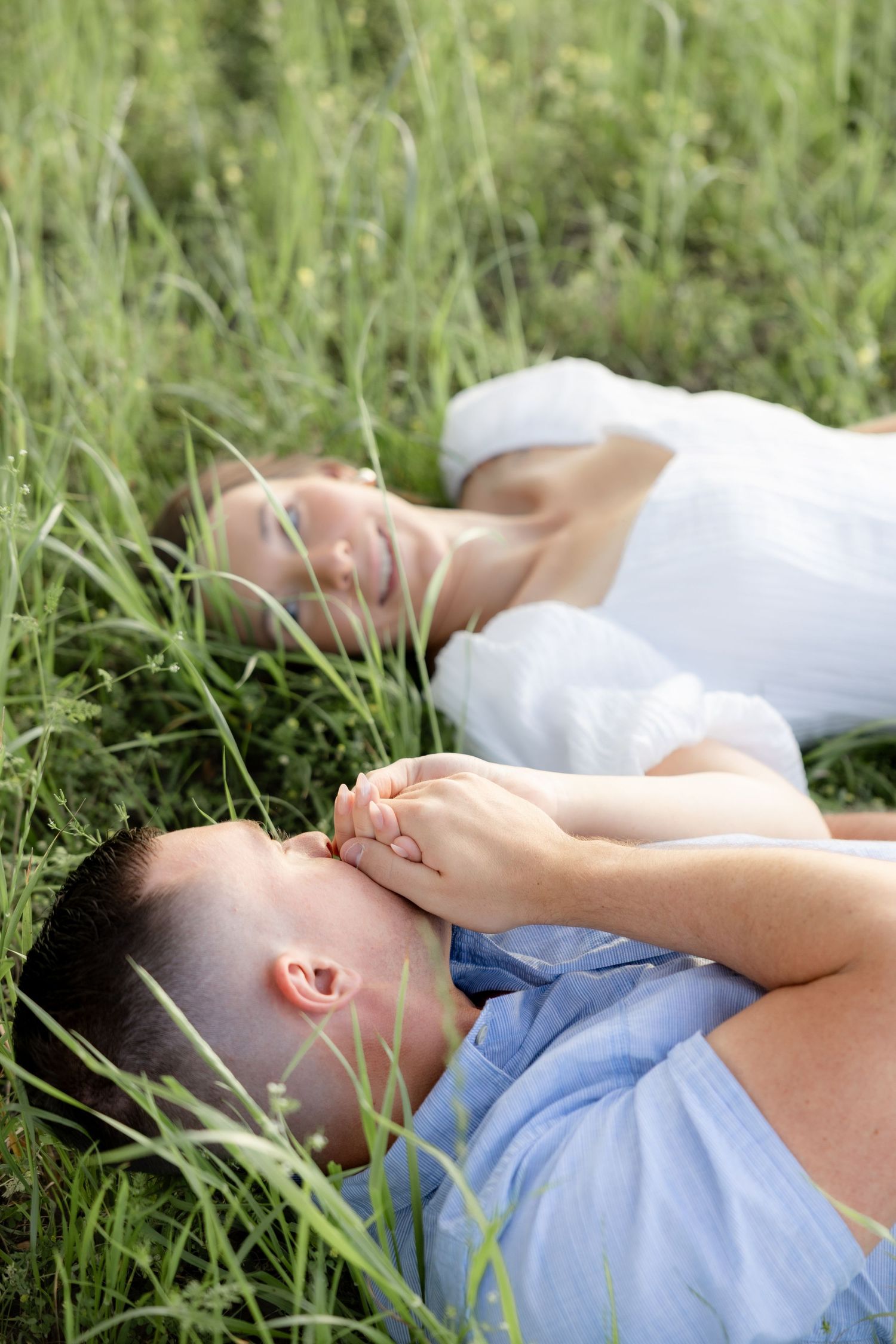 Storytelling couple photos in a tall grass field at sunset in Dothan, Alabama
