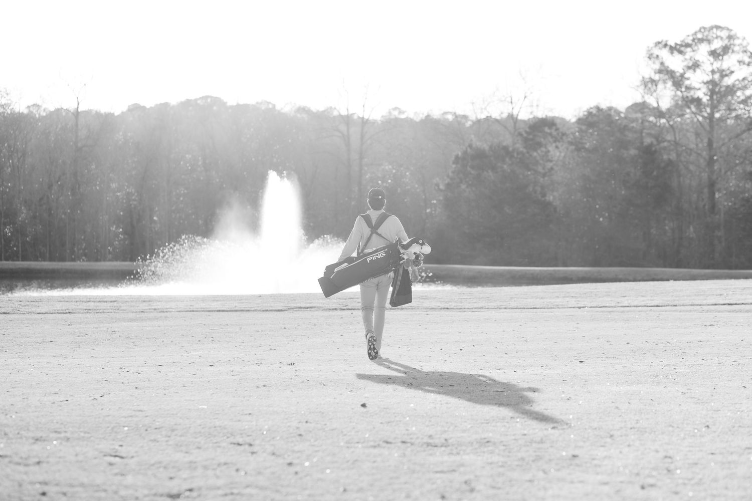 Senior playing golf on a golf course in Enterprise, Alabama