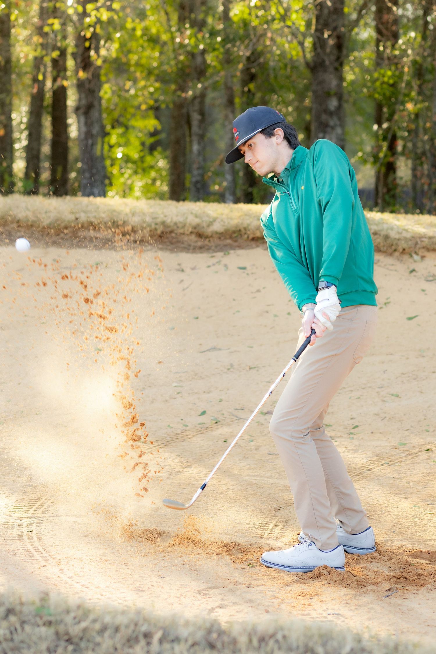 Senior playing golf on a golf course in Enterprise, Alabama