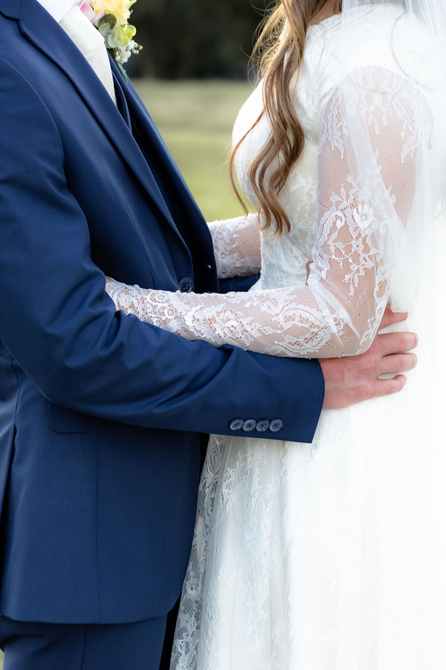 Bride and groom holding each other for portraits at Dalrymple Farms Enterprise, Alabama