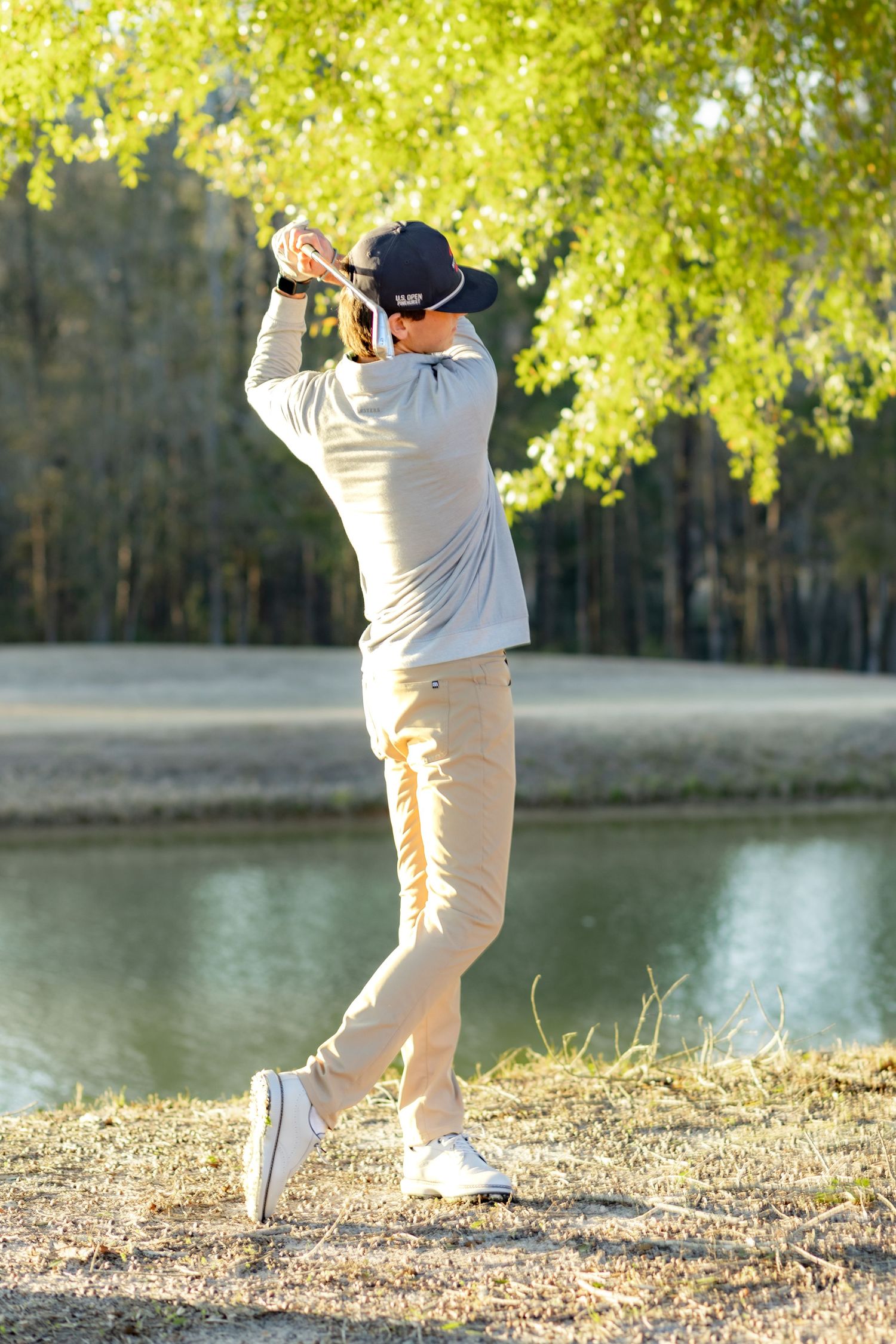 Senior playing golf on a golf course in Enterprise, Alabama