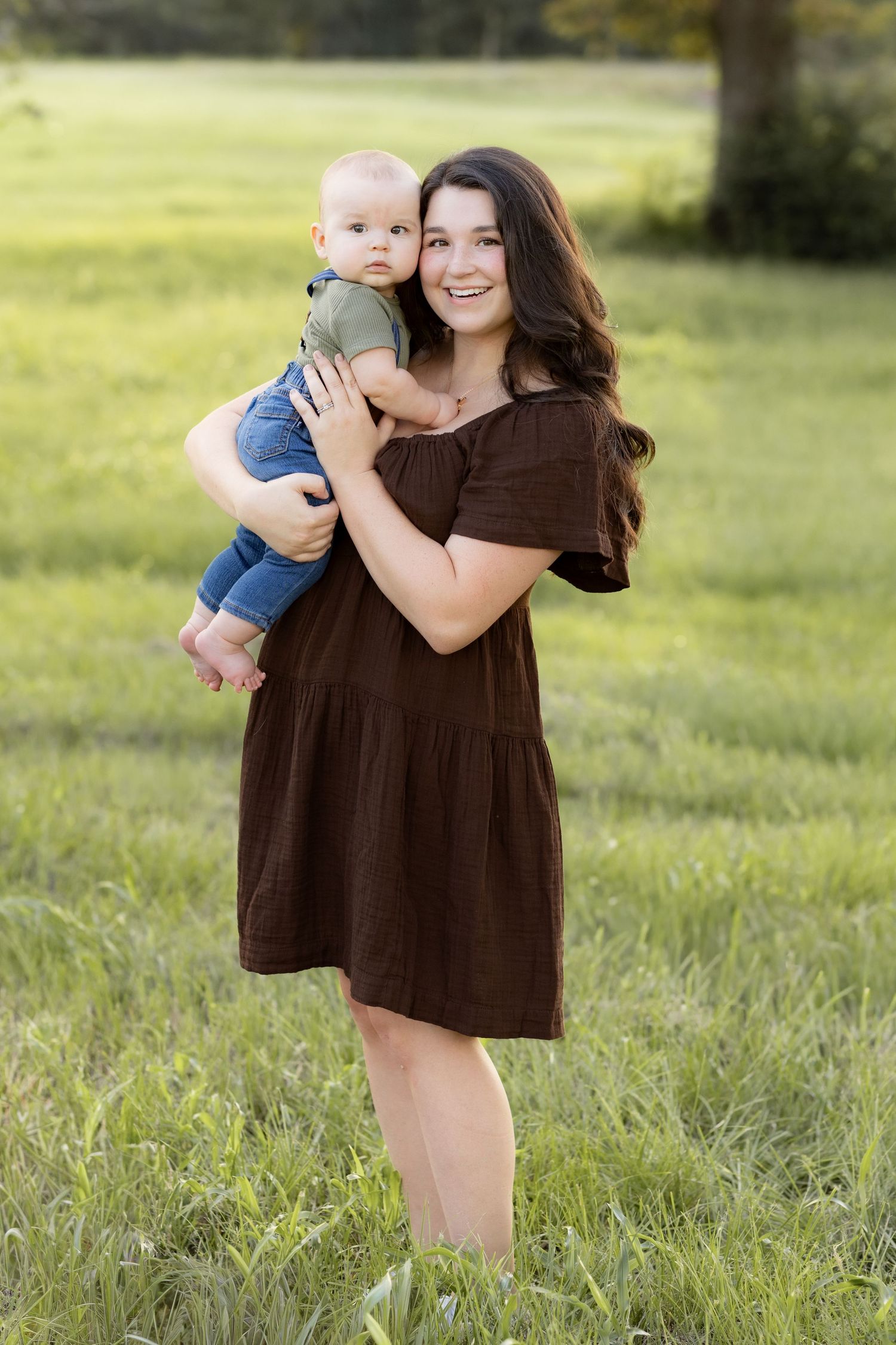 Family Pictures in a grass field at sunset near Dothan, Alabama