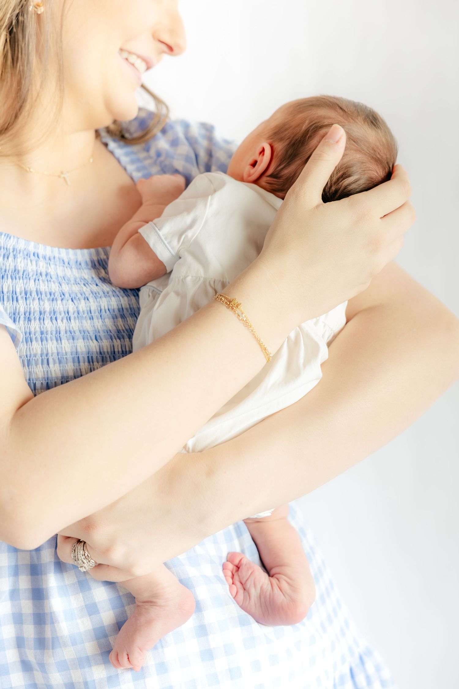 Mother holding her baby in a studio in Dothan, Alabama