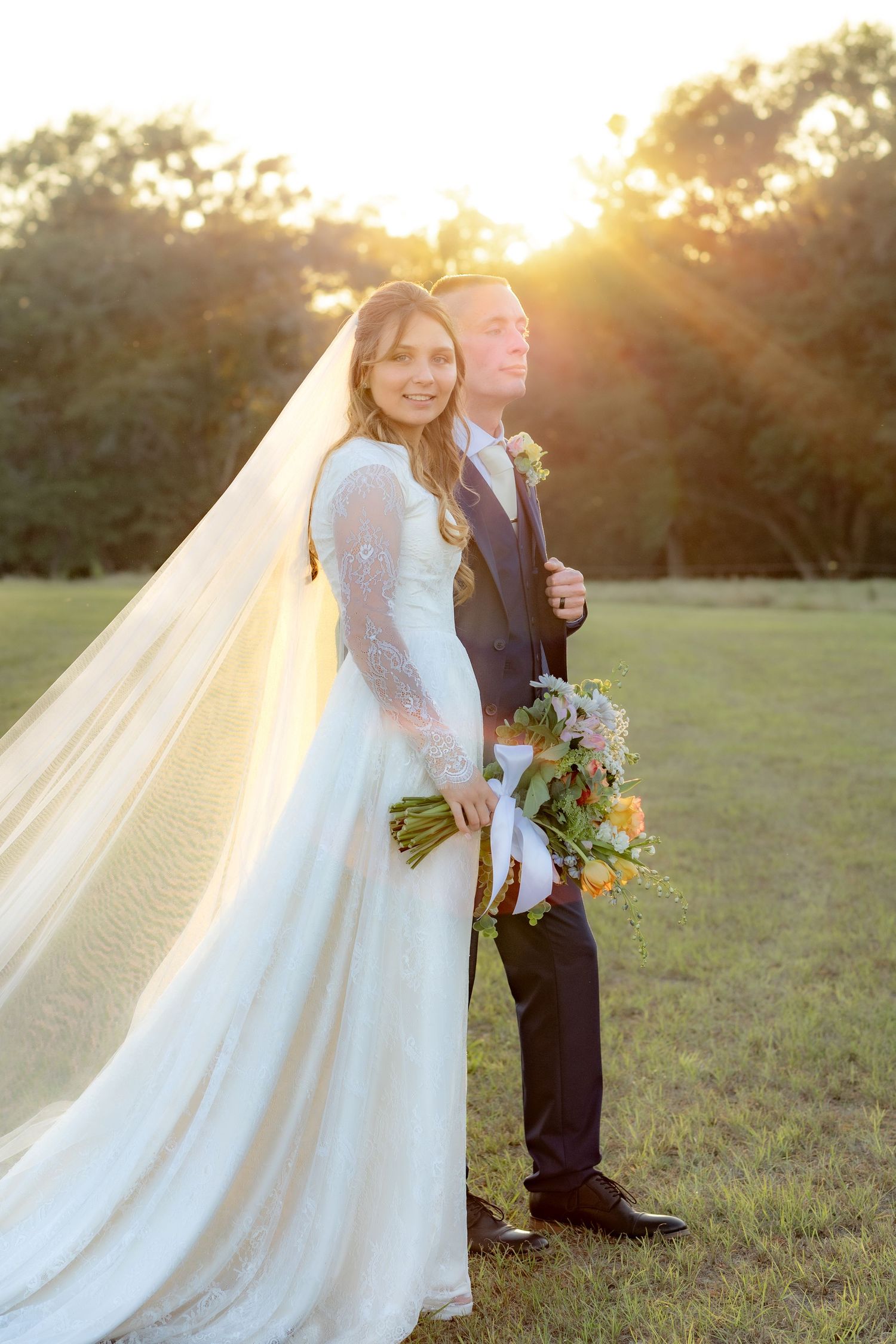Bride and groom holding each other for portraits at Dalrymple Farms Enterprise, Alabama