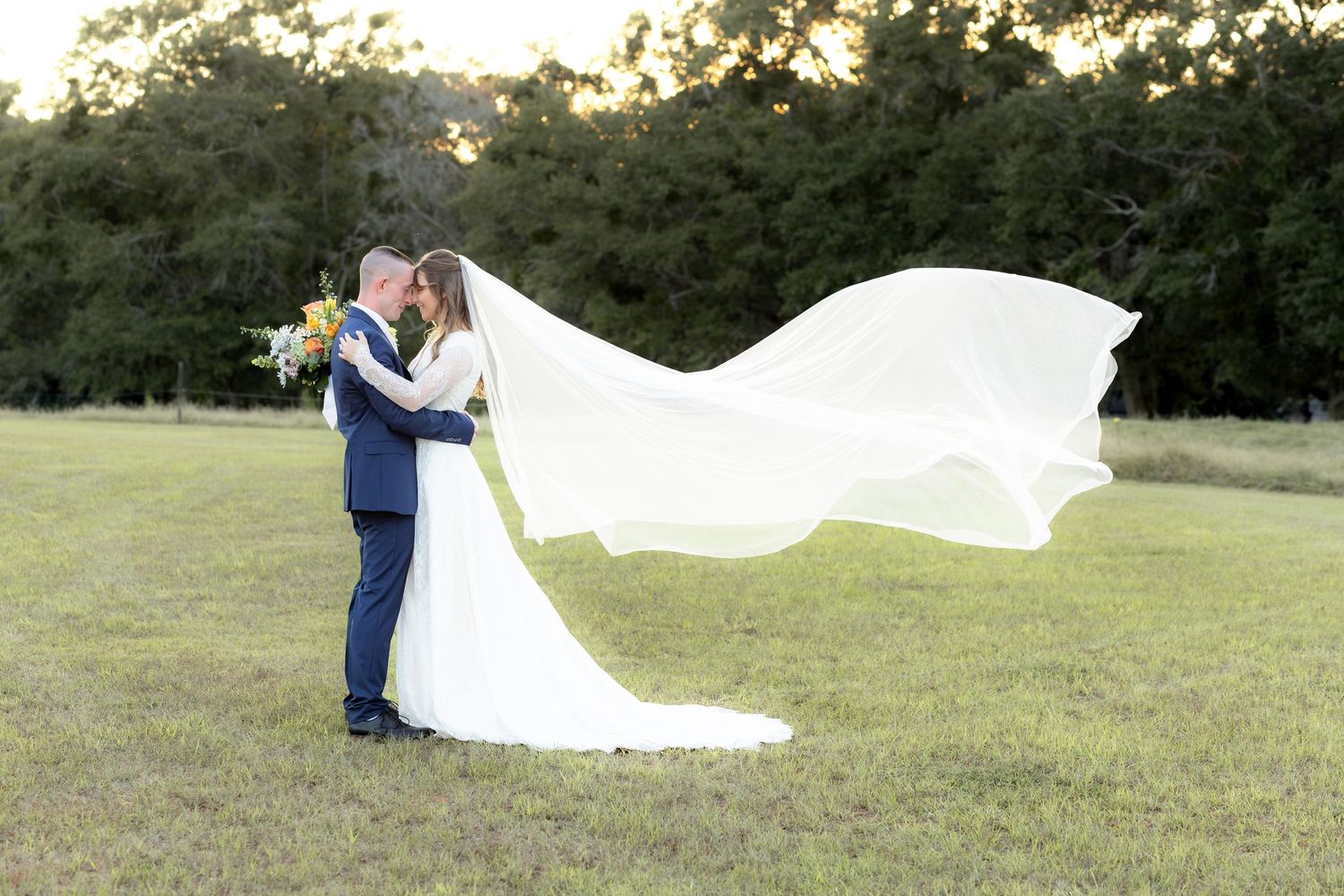 Bride and groom holding each other for portraits at Dalrymple Farms Enterprise, Alabama