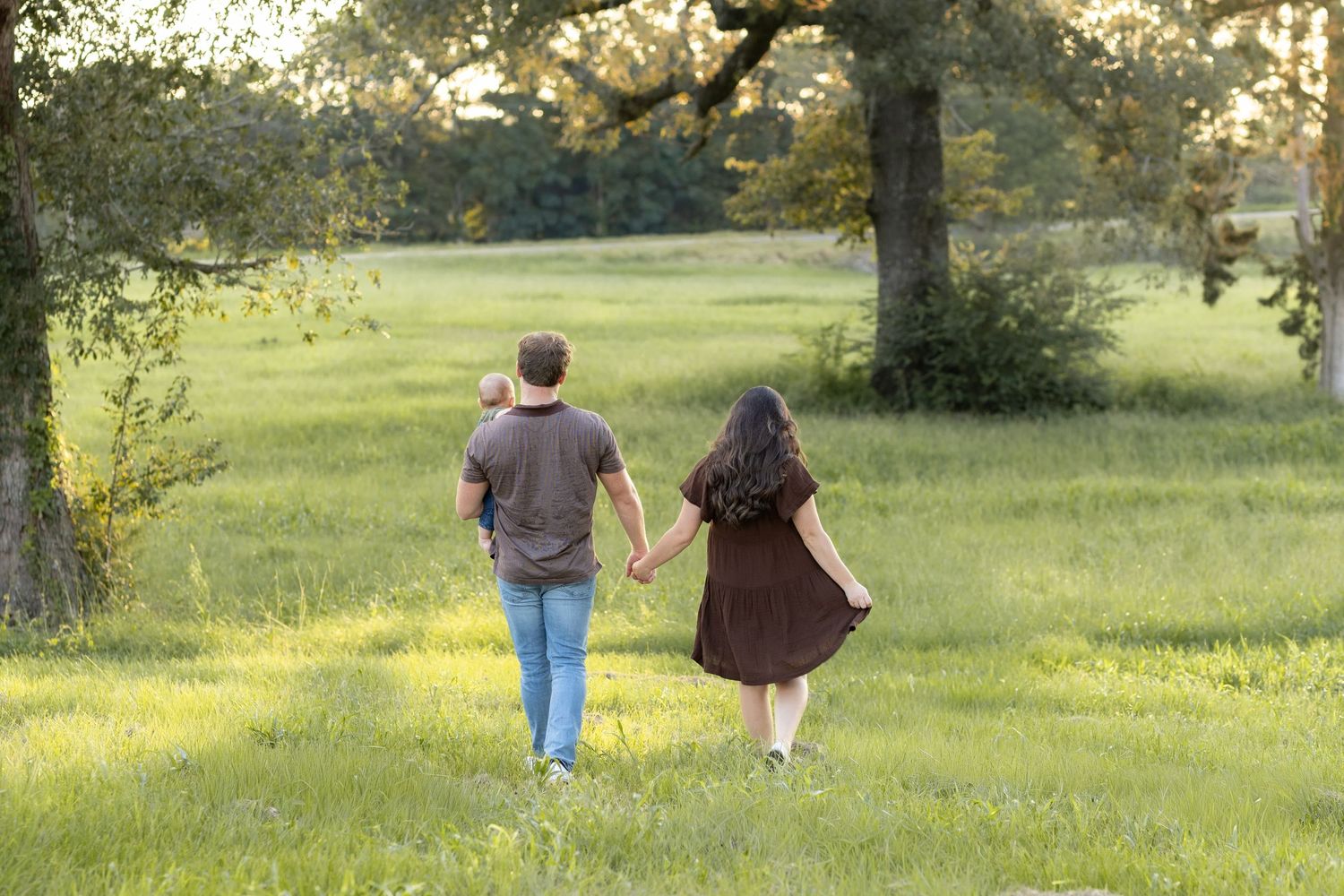 Family Pictures in a grass field at sunset near Dothan, Alabama