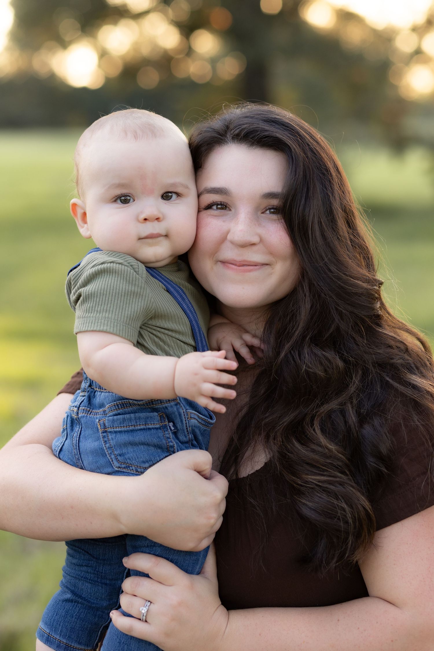 Family Pictures in a grass field at sunset near Dothan, Alabama