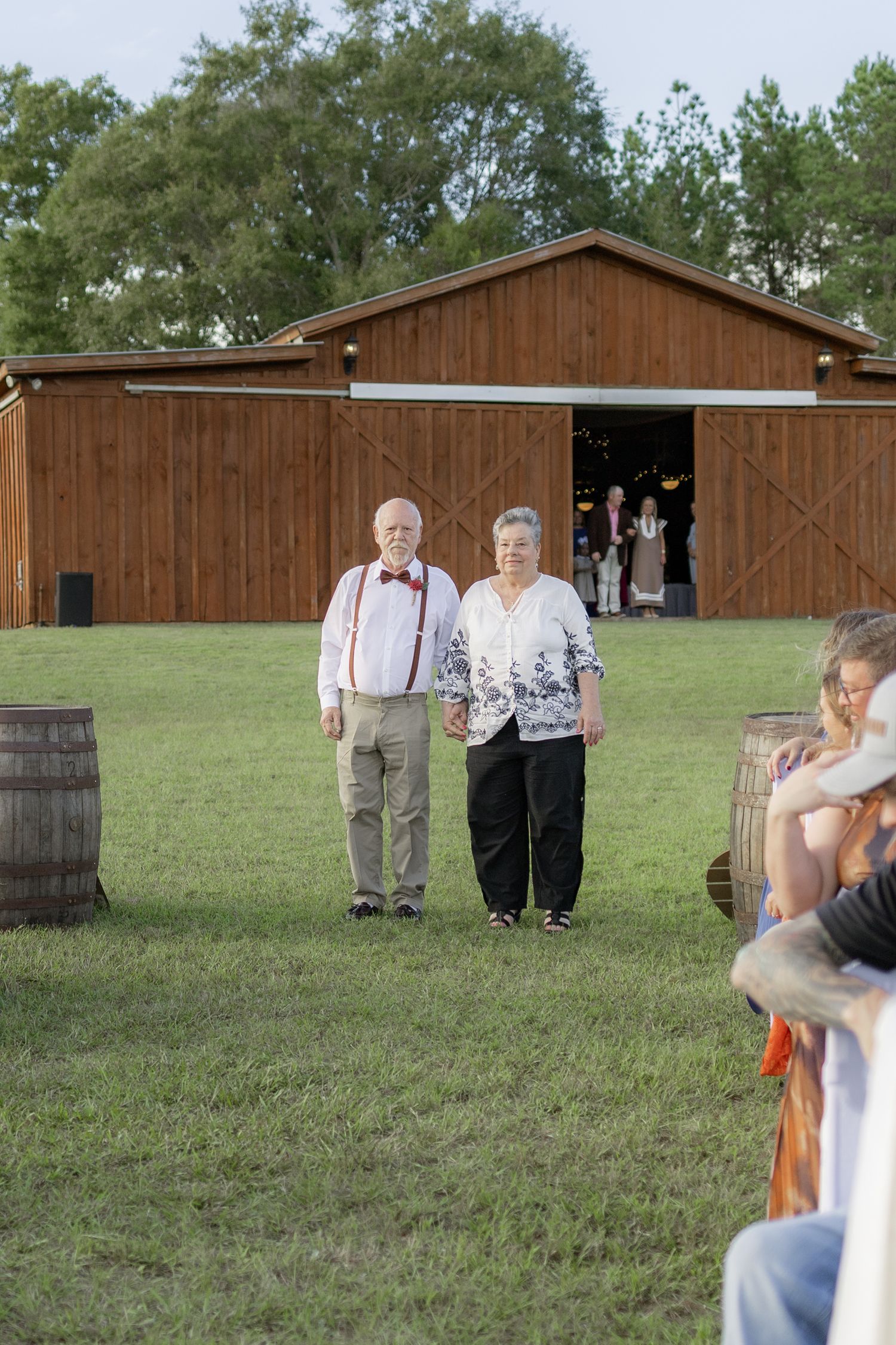 Bridal party walking down the aisle of a wedding at Hilltop Acres Wicksburg, Alabama