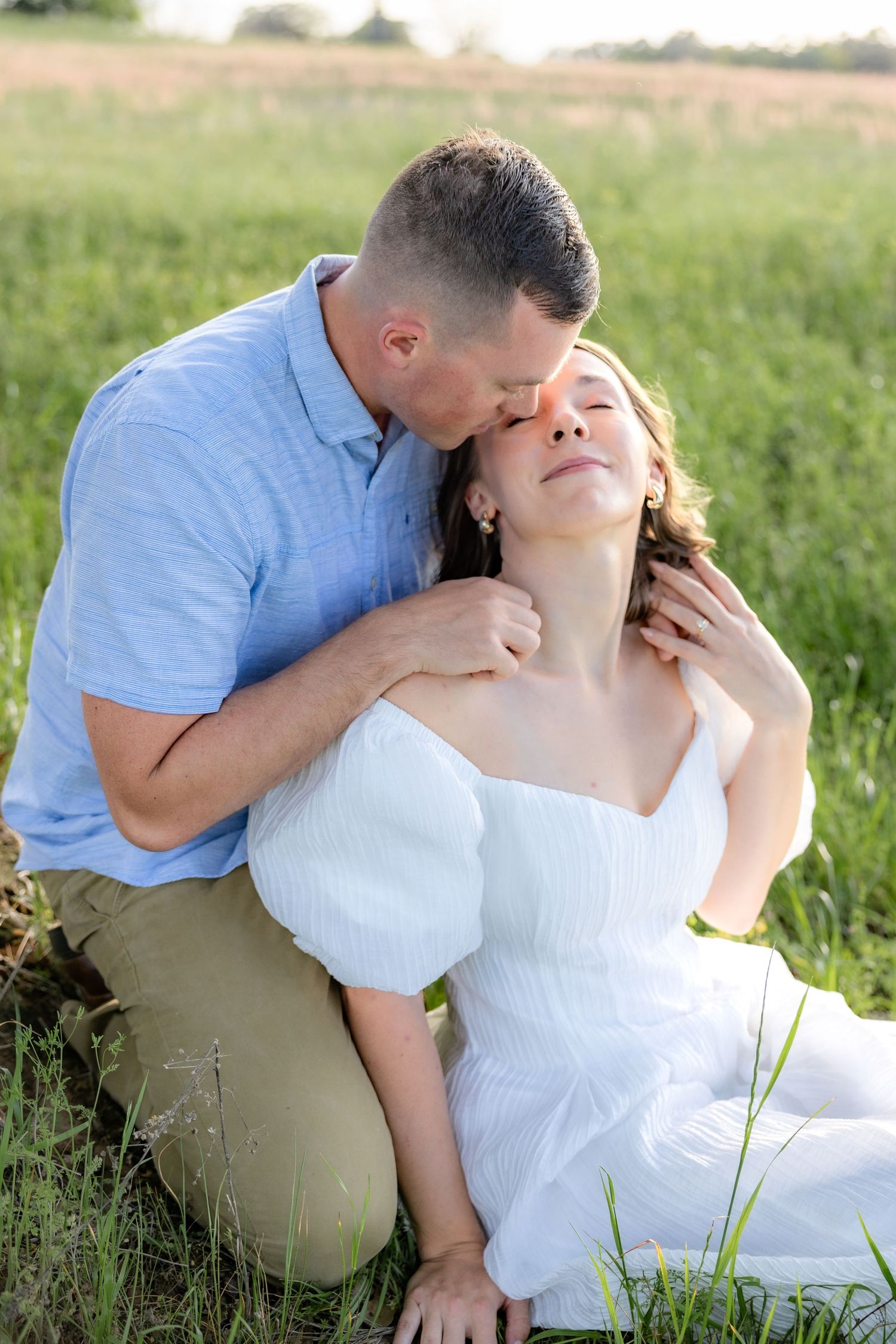 Storytelling romantic couple photos in a tall grass field at sunset in Dothan, Alabama