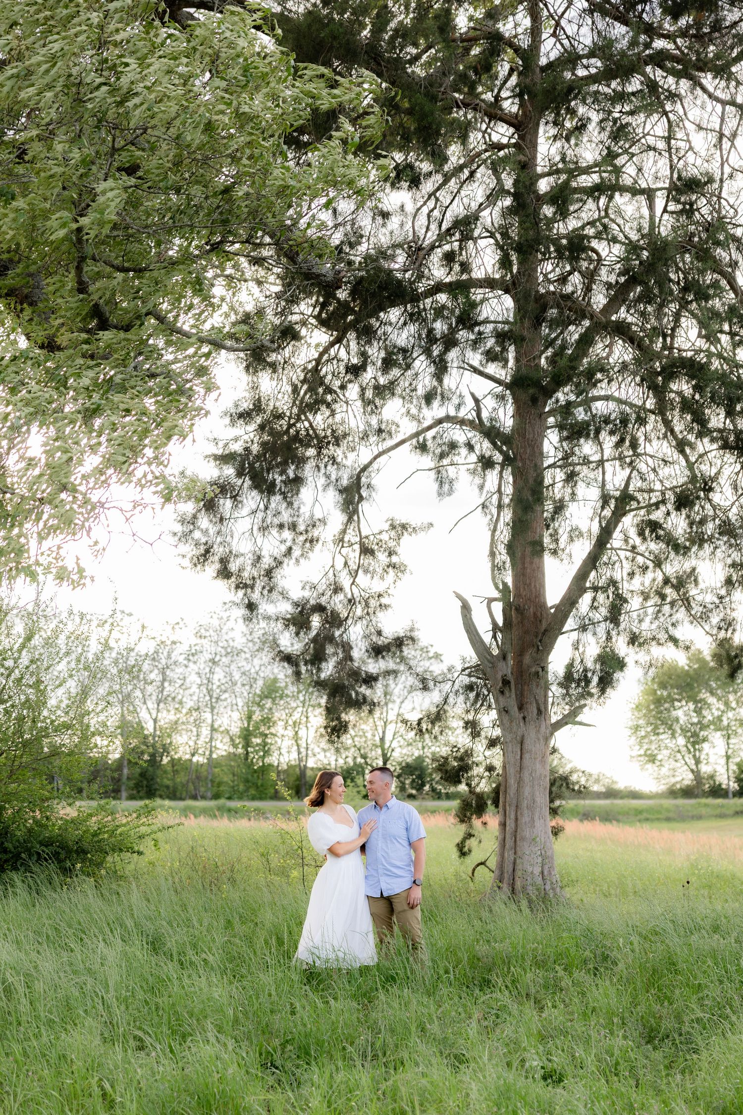 Storytelling romantic couple photos in a tall grass field at sunset in Dothan, Alabama