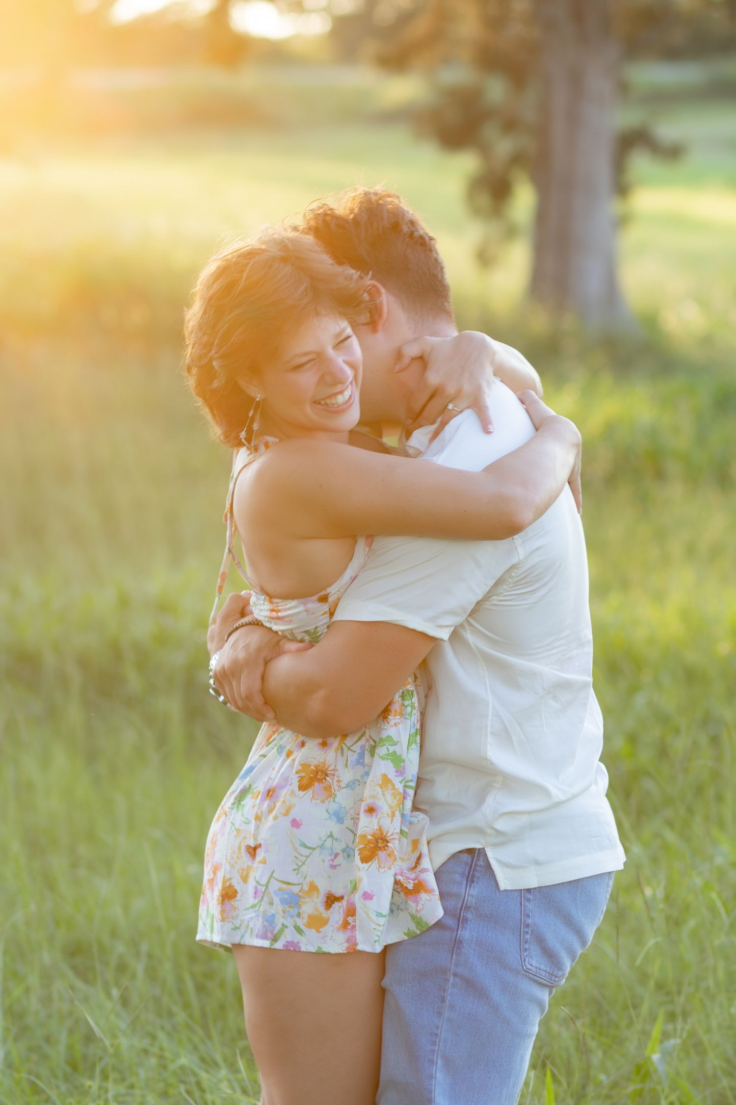 Romantic Couples photos in a tall grass field at sunset near Dothan, Alabama