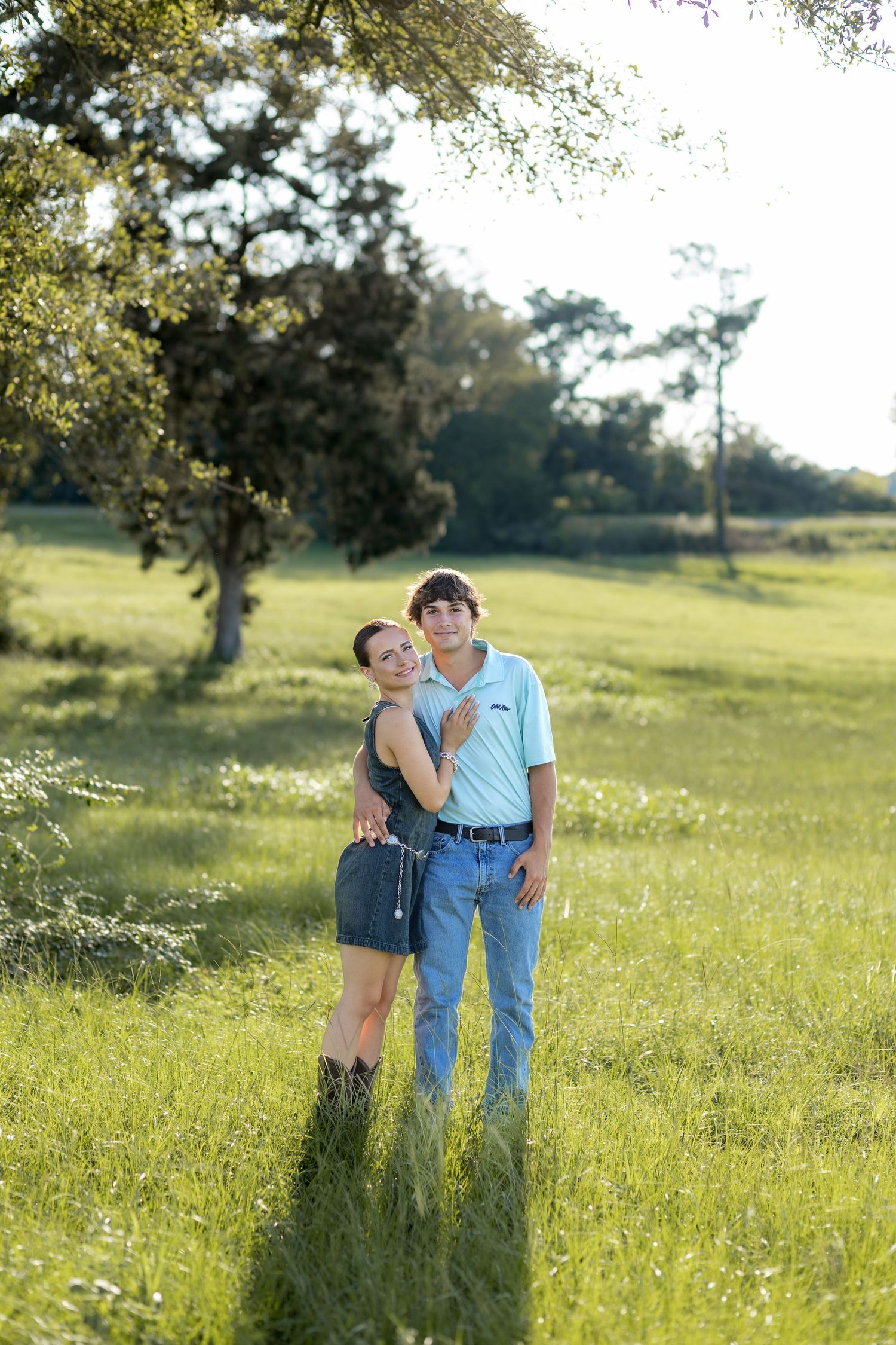 Couple Photos in a grass field at sunset near Dothan, Alabama