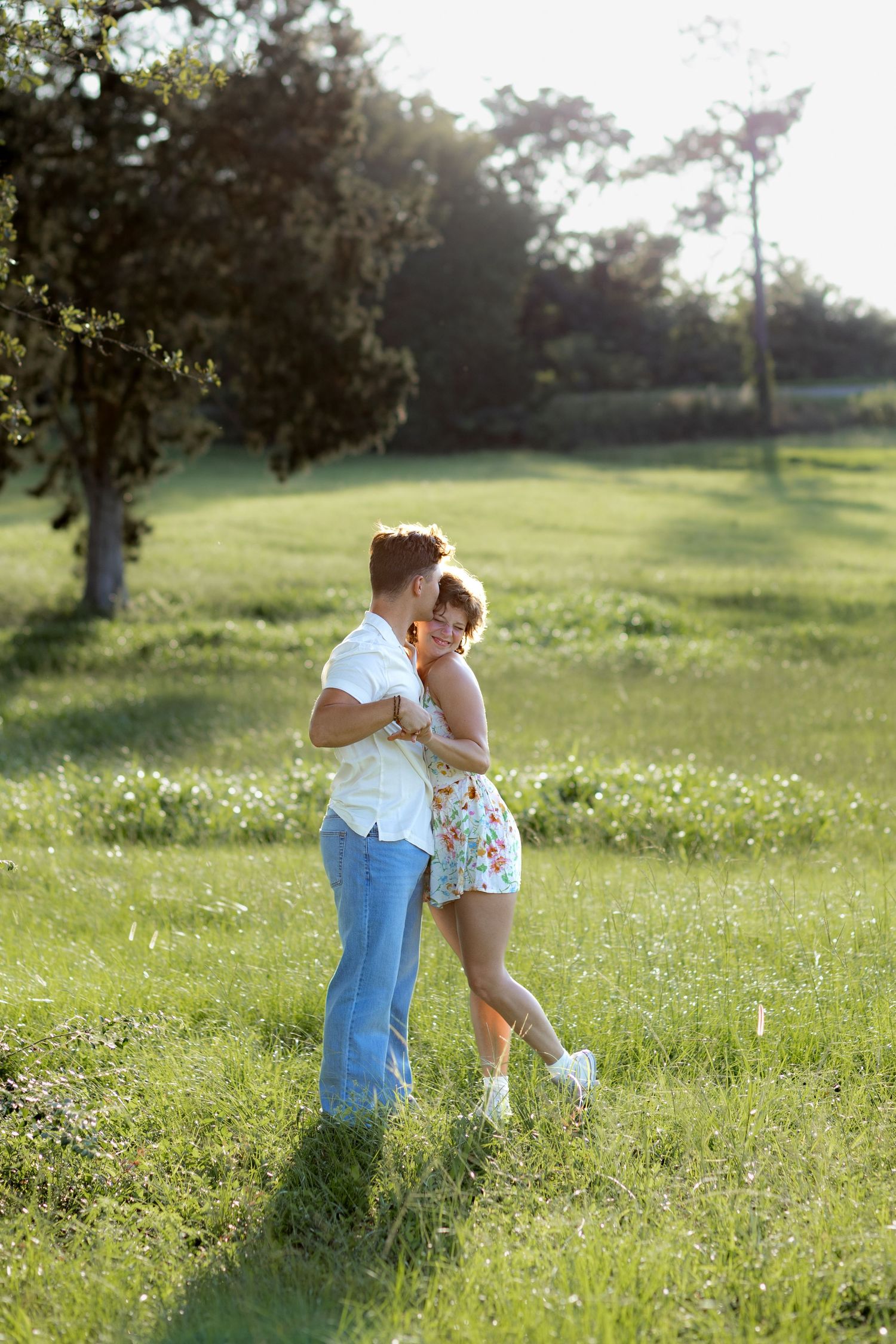 Couple Photos in a grass field at sunset near Dothan, Alabama