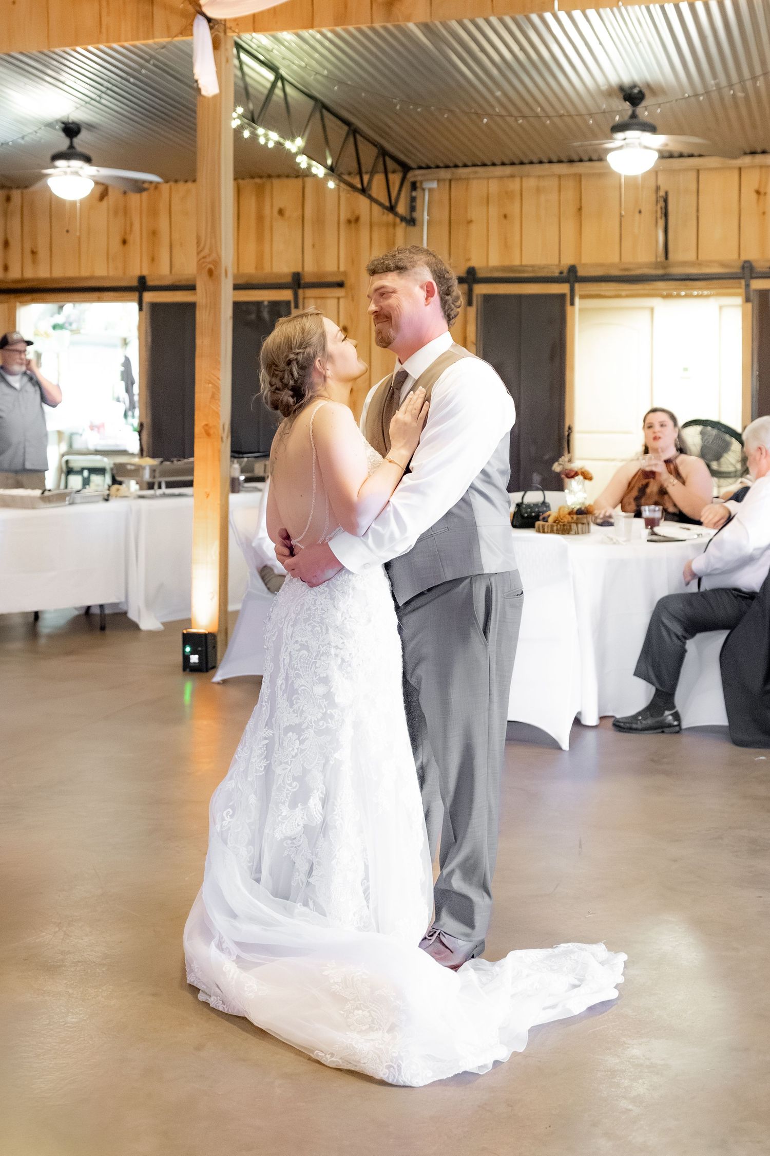Bride and groom dance at a wedding at Hilltop Acres Wicksburg, Alabama