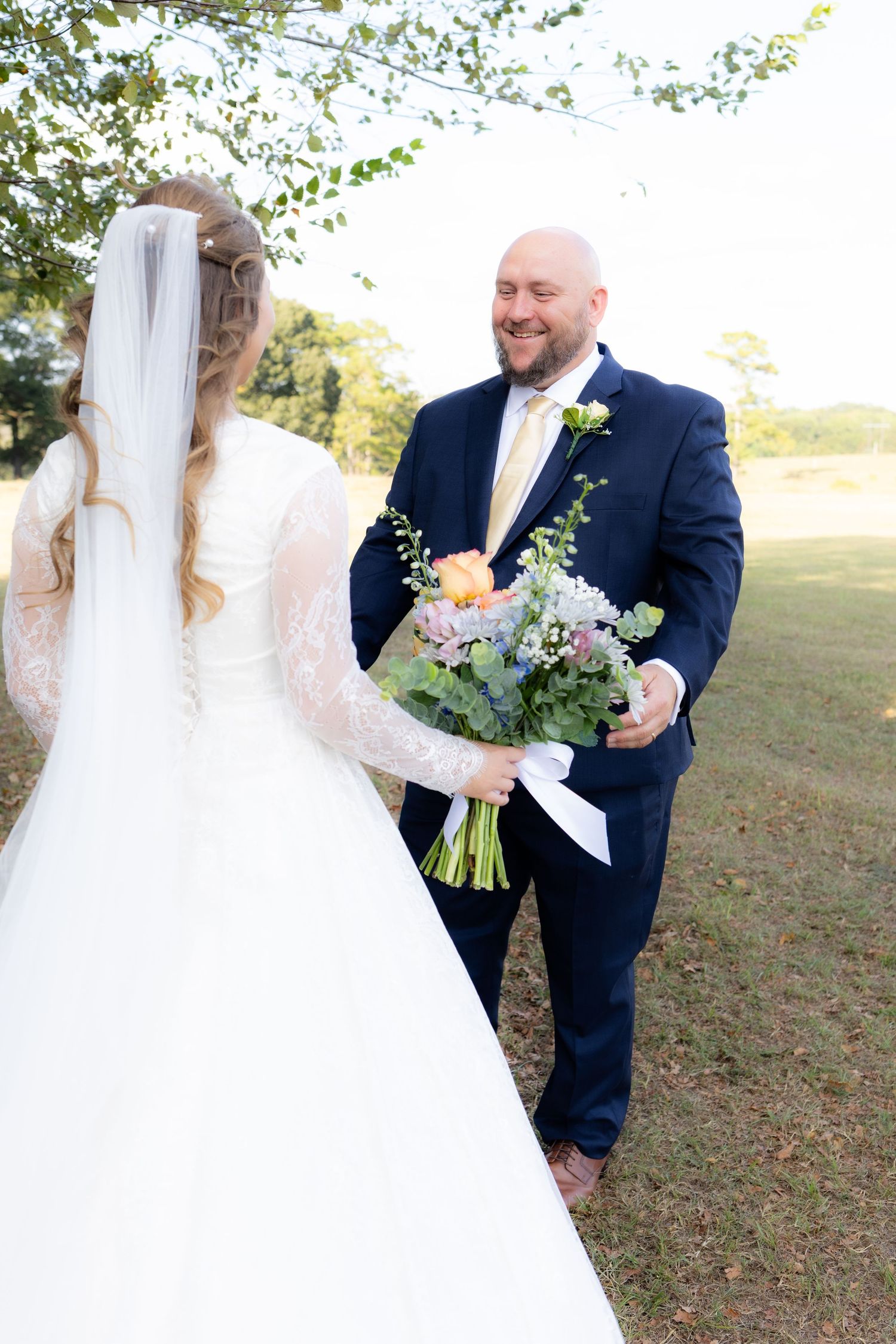 Bride and father first look at wedding venue Dalrymple Farms Enterprise, Alabama