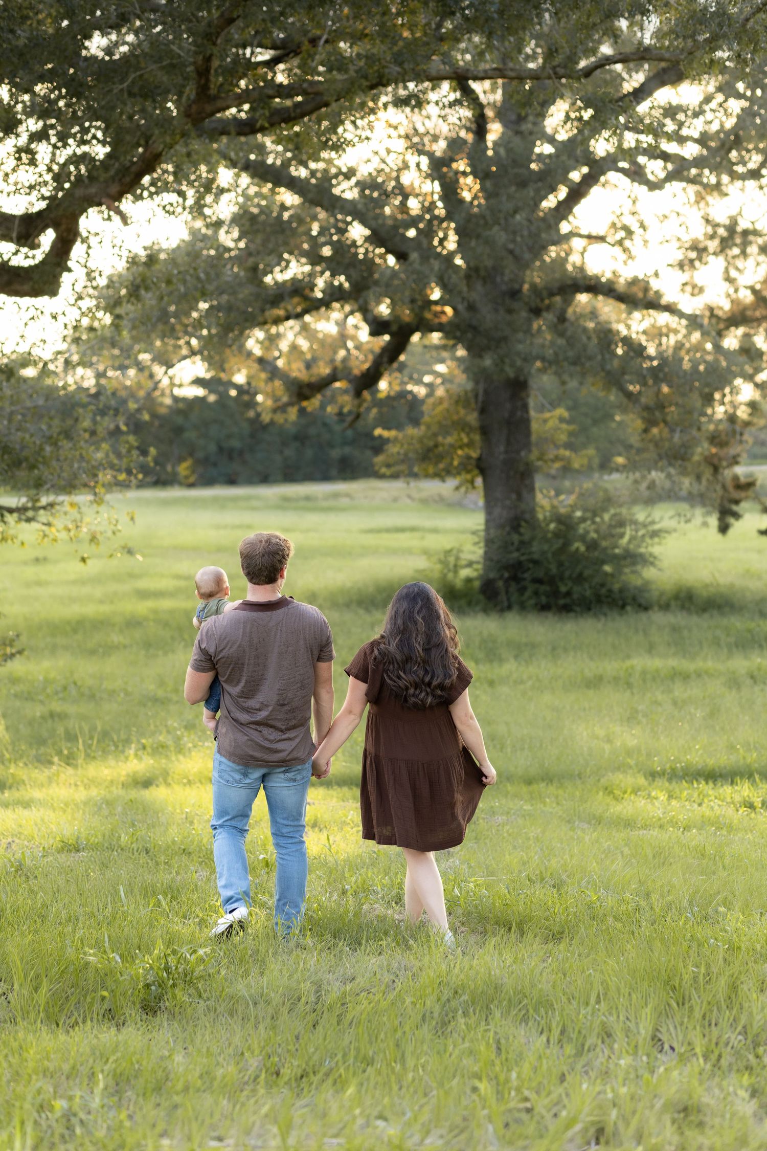Family Pictures in a grass field at sunset near Dothan, Alabama