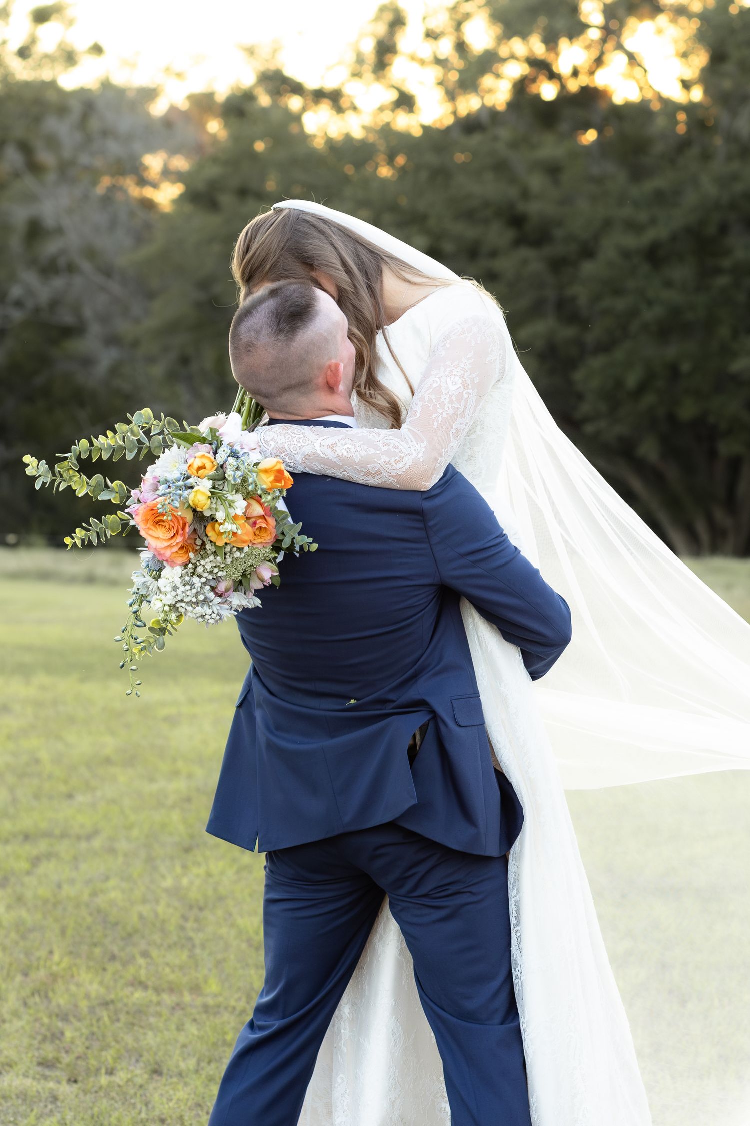 Bride and groom holding each other for portraits at Dalrymple Farms Enterprise, Alabama