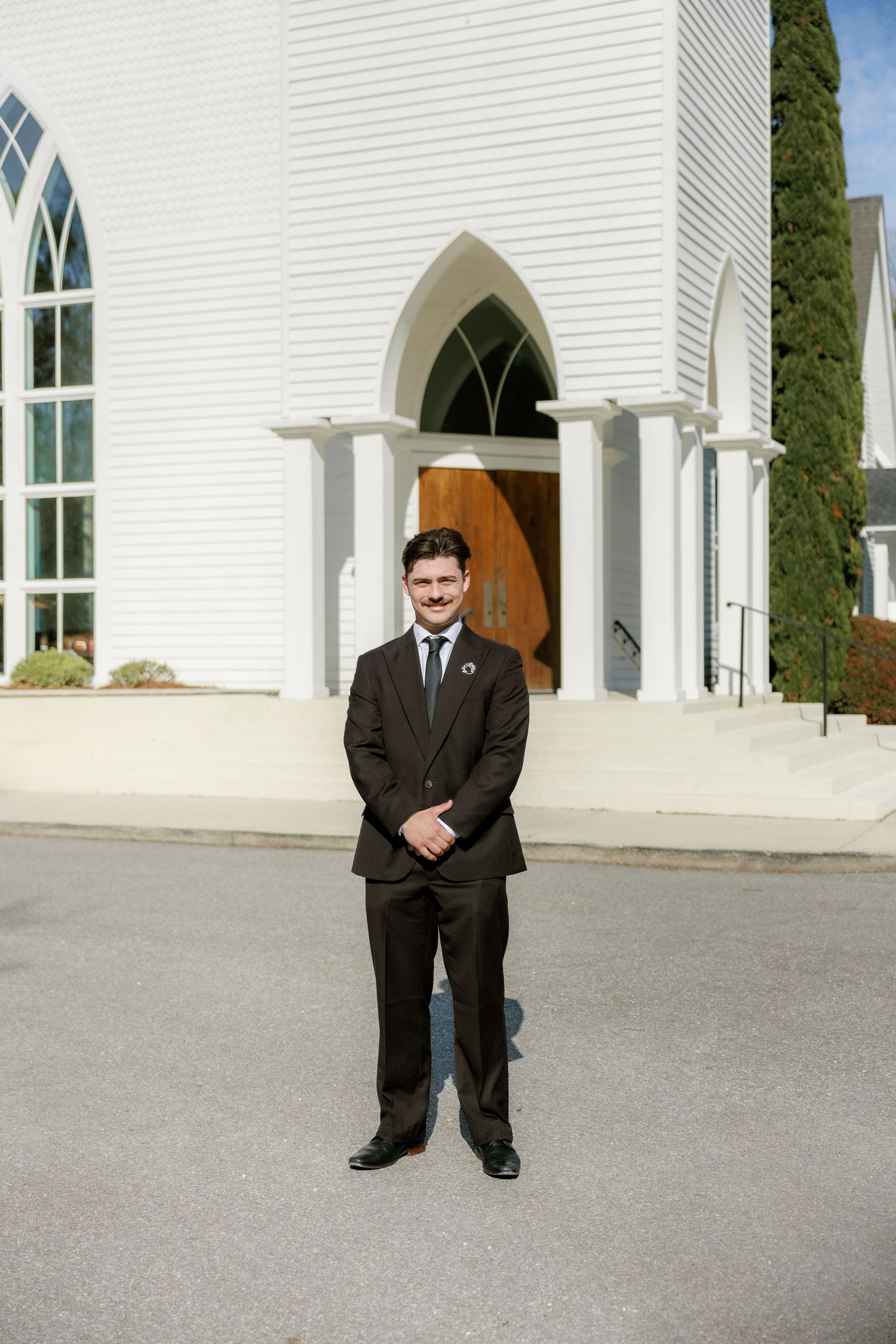 Wedding Groom Portraits at Saint Francis at The Point Anglican Church Fairhope, Alabama