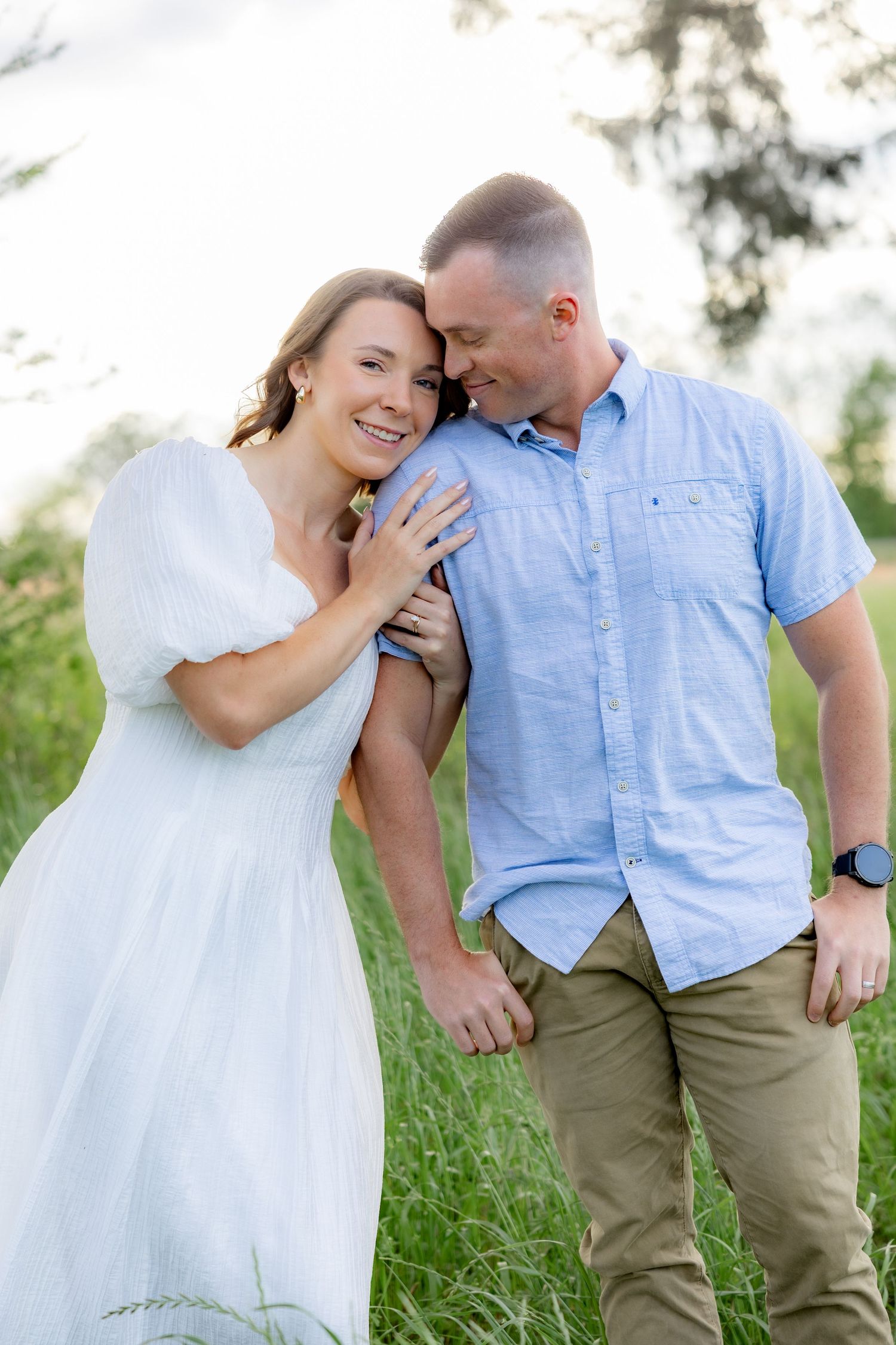 Storytelling romantic couple photos in a tall grass field at sunset in Dothan, Alabama