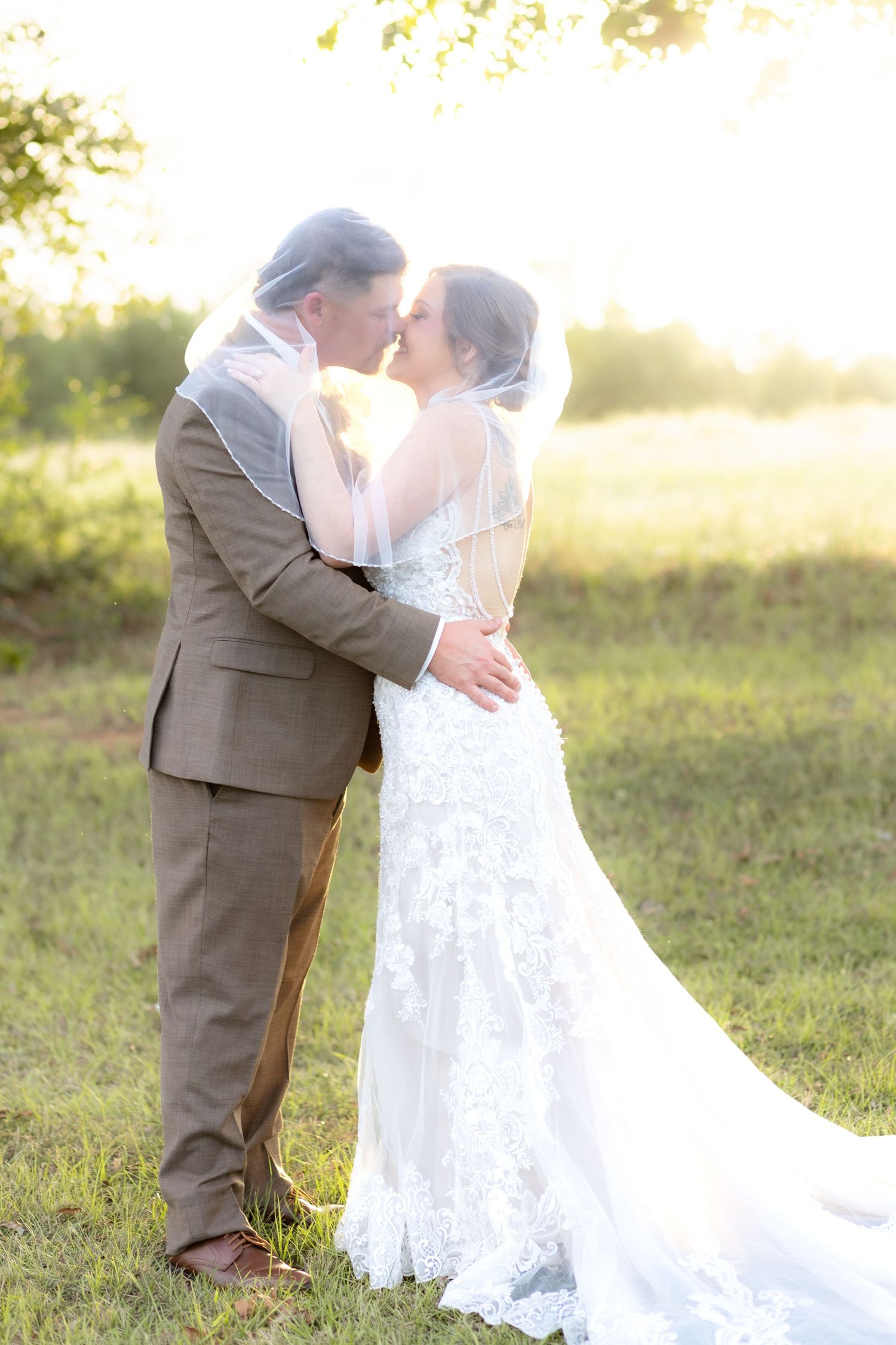 Wedding Couple Portraits at Sunset at Hilltop Acres Wicksburg, Alabama