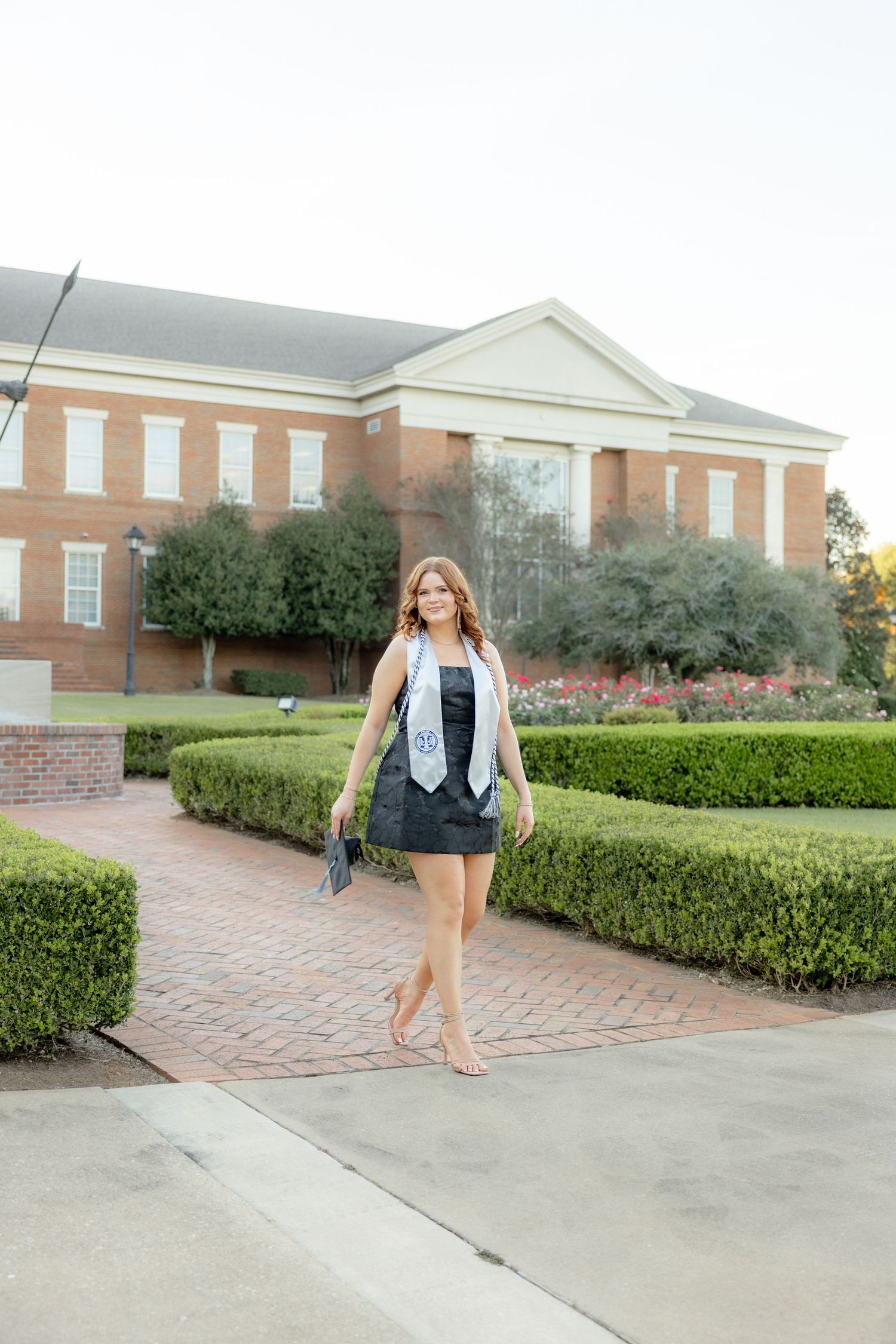 Senior cap and gown portraits at Troy University Dothan Campus
