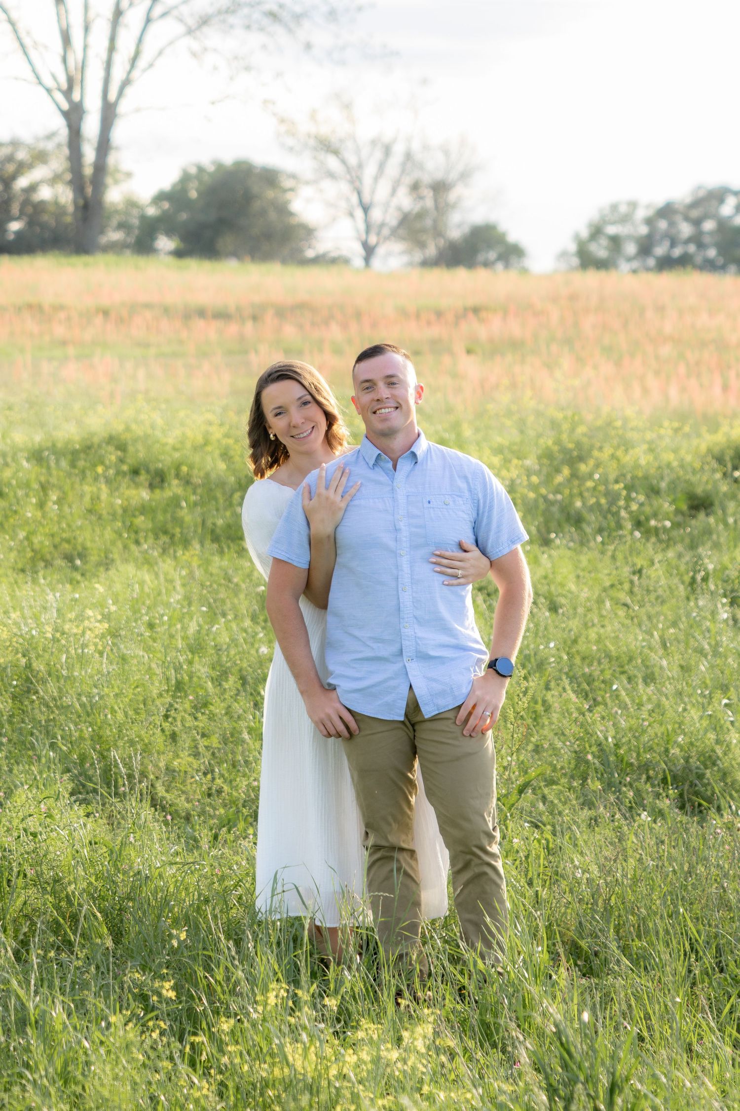 Storytelling romantic couple photos in a tall grass field at sunset in Dothan, Alabama
