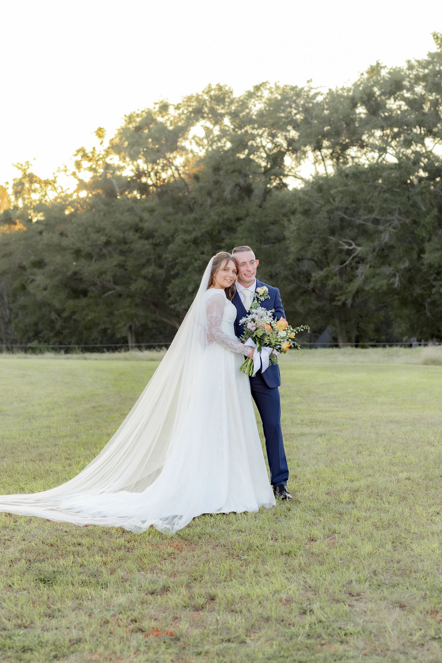 Bride and groom holding each other for portraits at Dalrymple Farms Enterprise, Alabama