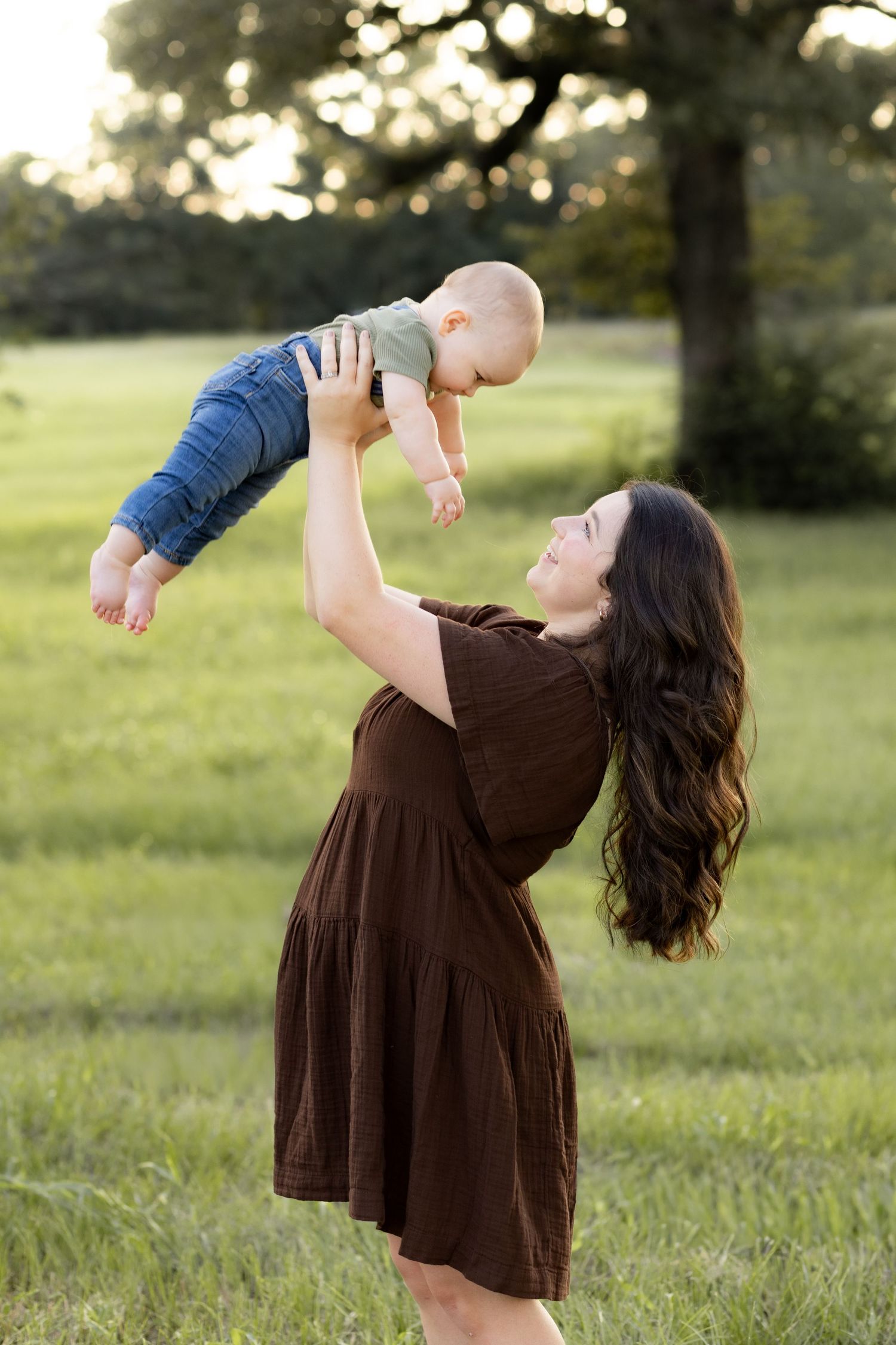 Family Pictures in a grass field at sunset near Dothan, Alabama