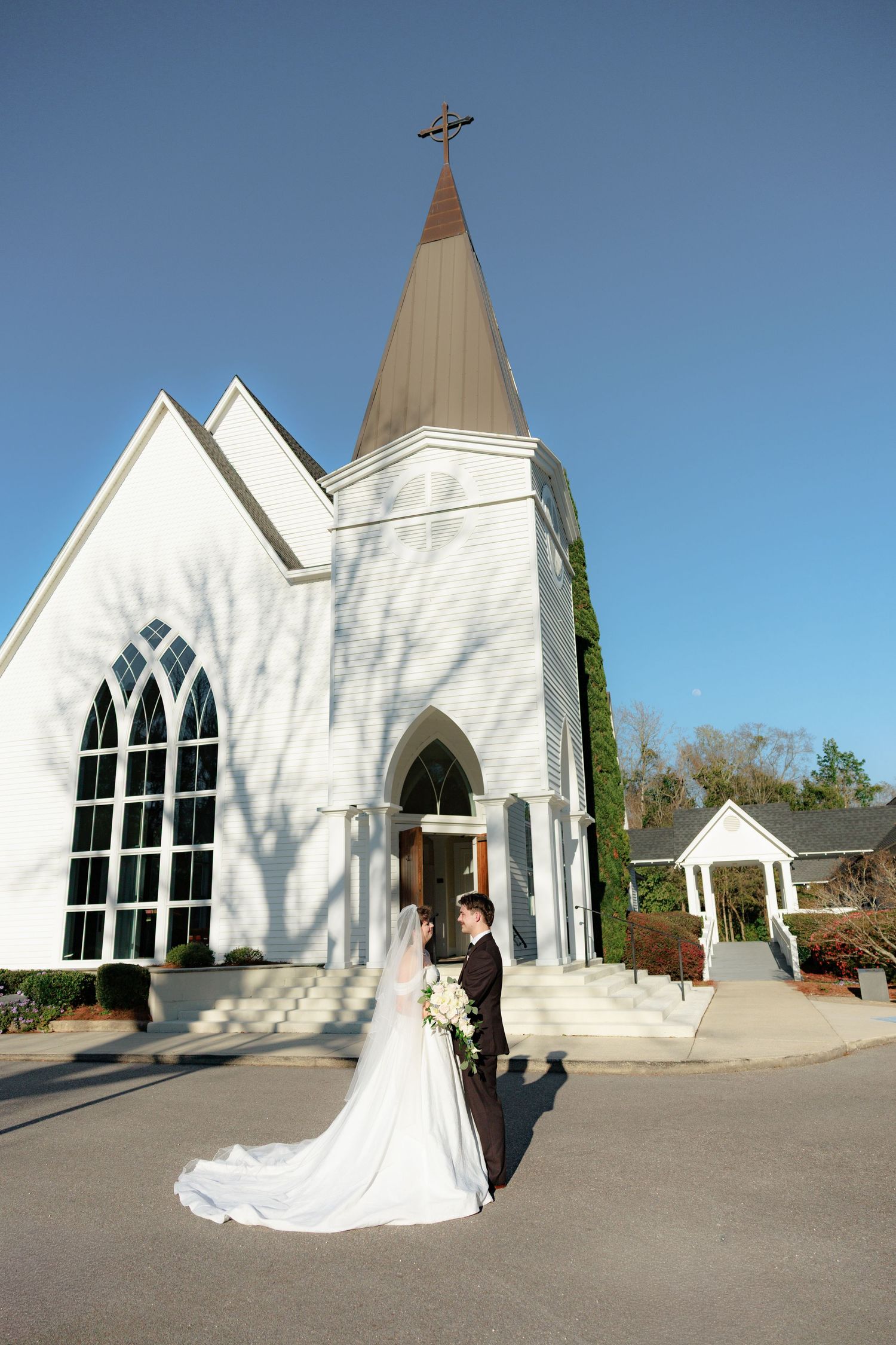 Couple portraits at Saint Francis at the Point Anglican Church Fairhope, Alabama