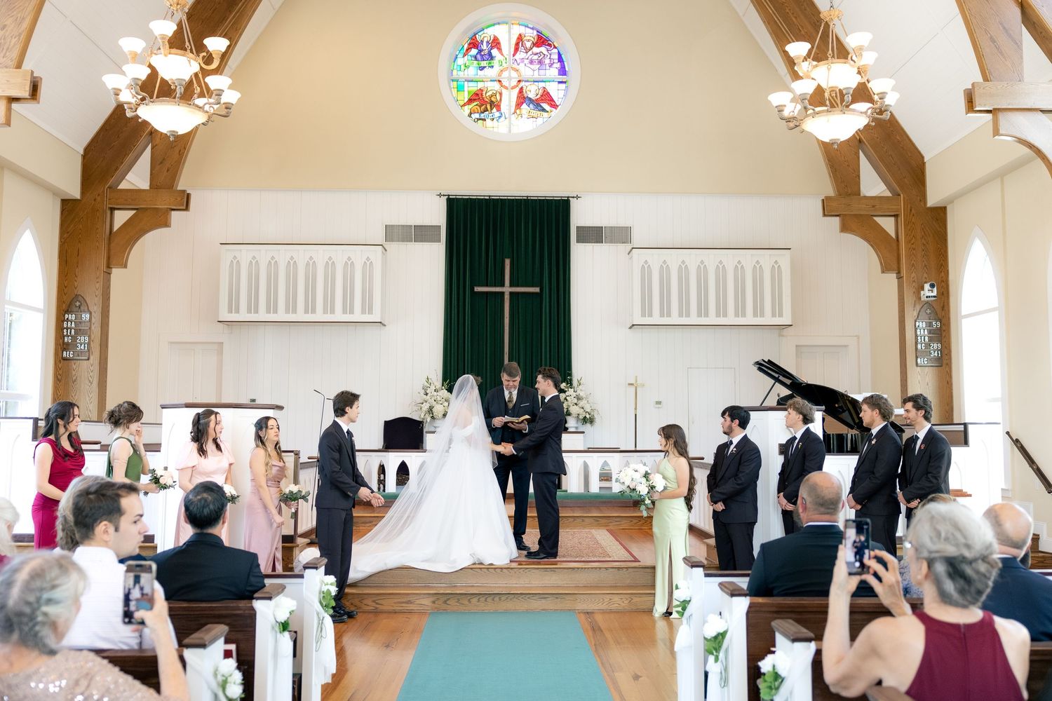 Wedding ceremony at Saint Francis at the Point Anglican Church Fairhope, Alabama