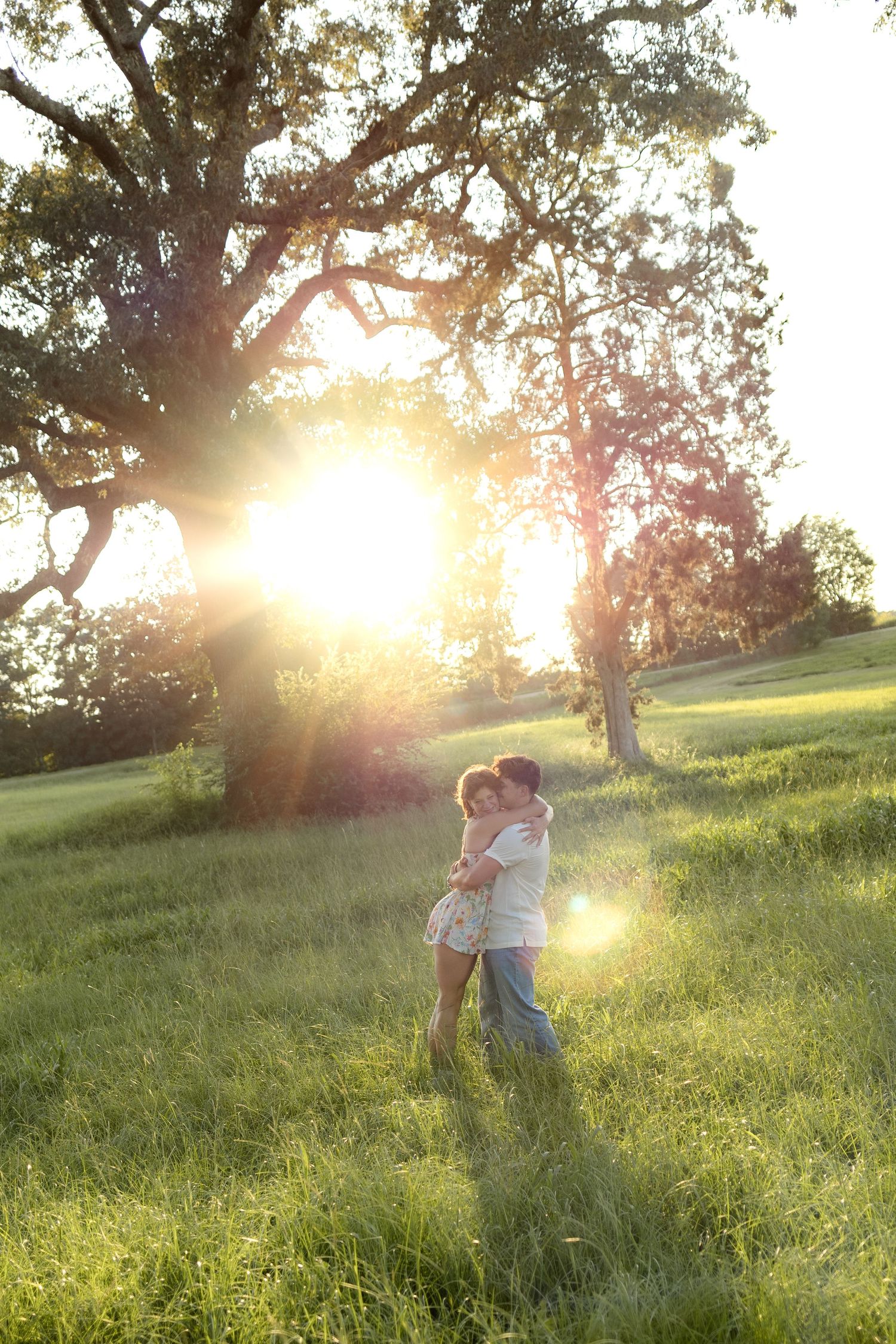 Romantic Couples photos in a tall grass field at sunset near Dothan, Alabama