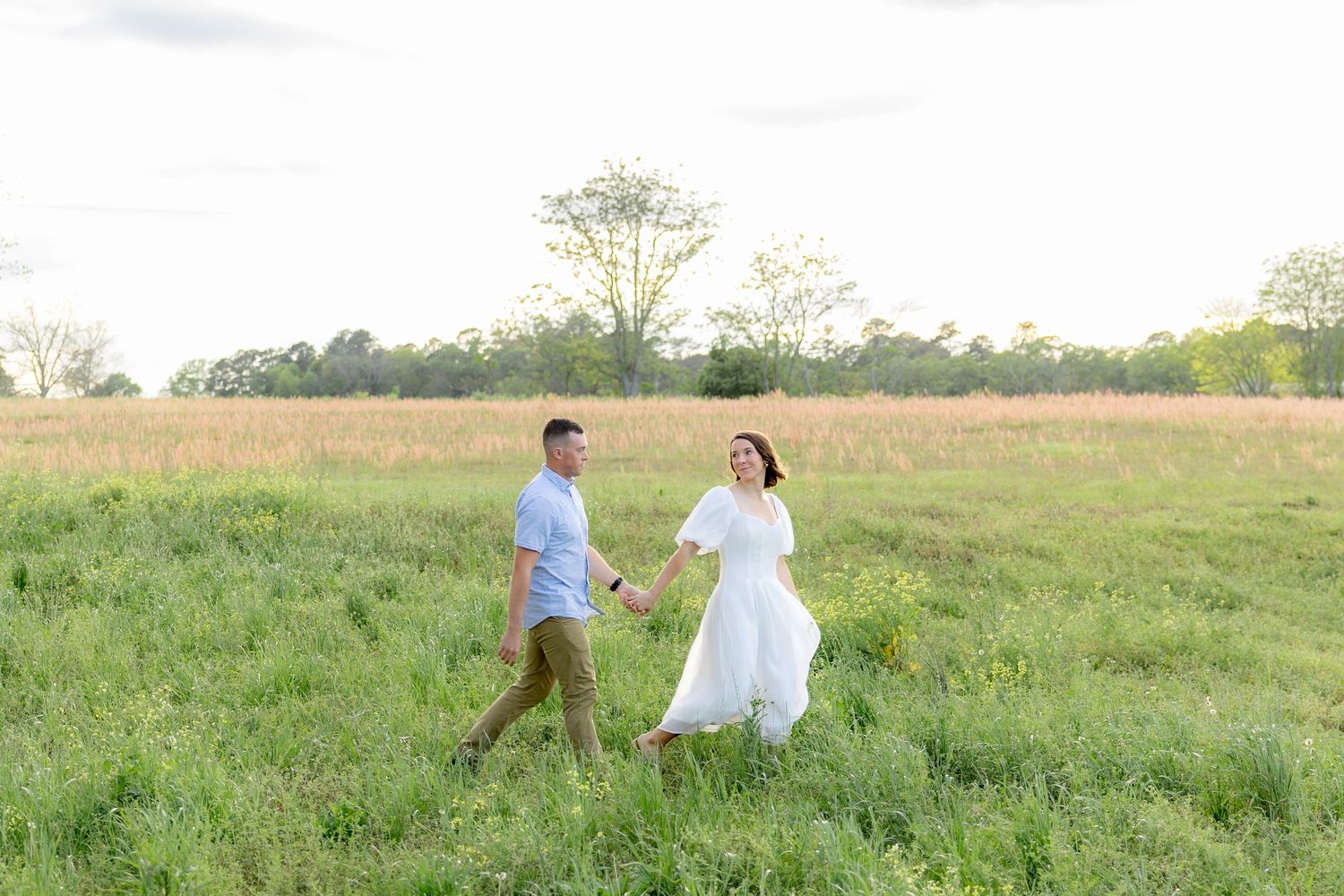 Storytelling romantic couple photos in a tall grass field at sunset in Dothan, Alabama