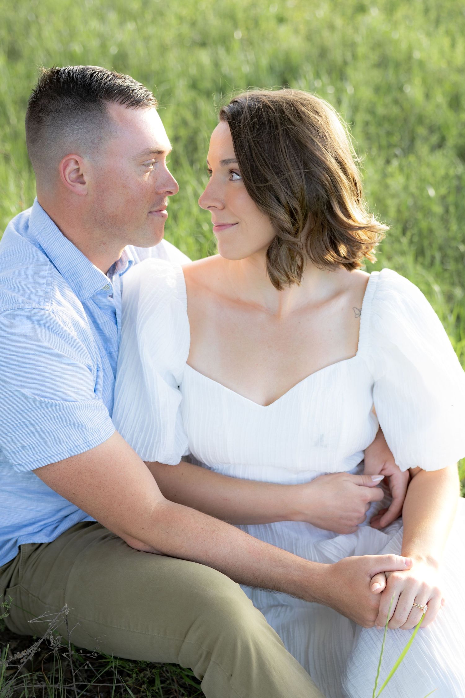 Storytelling romantic couple photos in a tall grass field at sunset in Dothan, Alabama