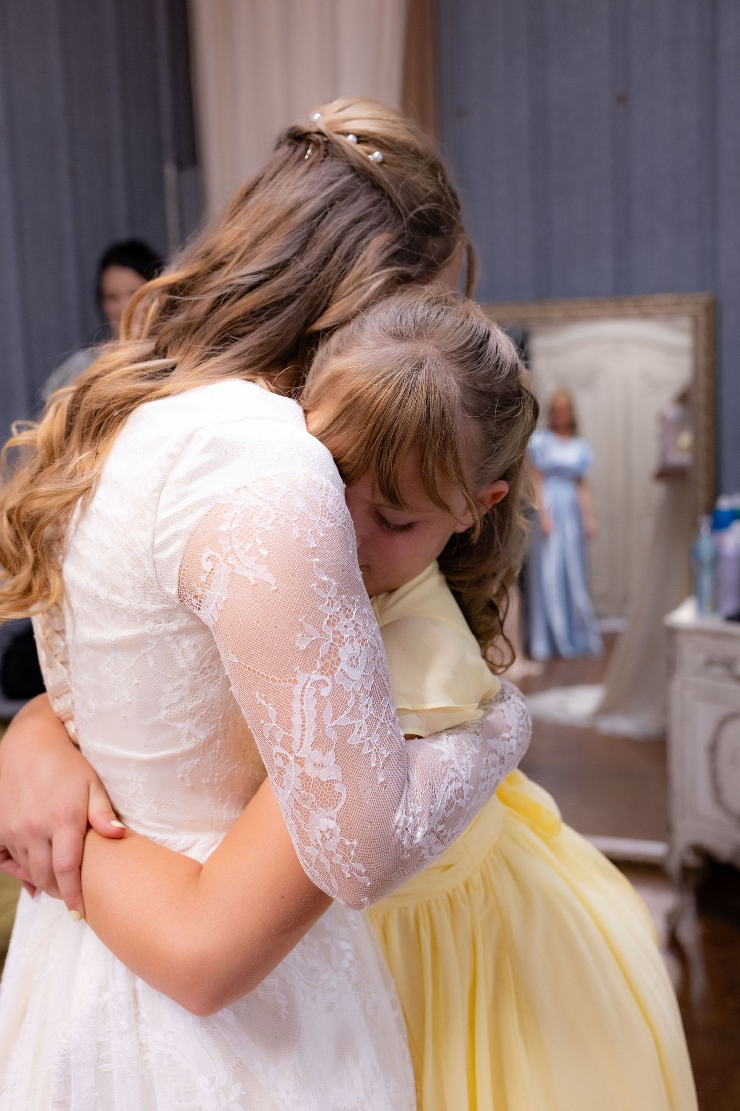 Bride first look with sister at wedding venue Dalrymple Farms Enterprise, Alabama