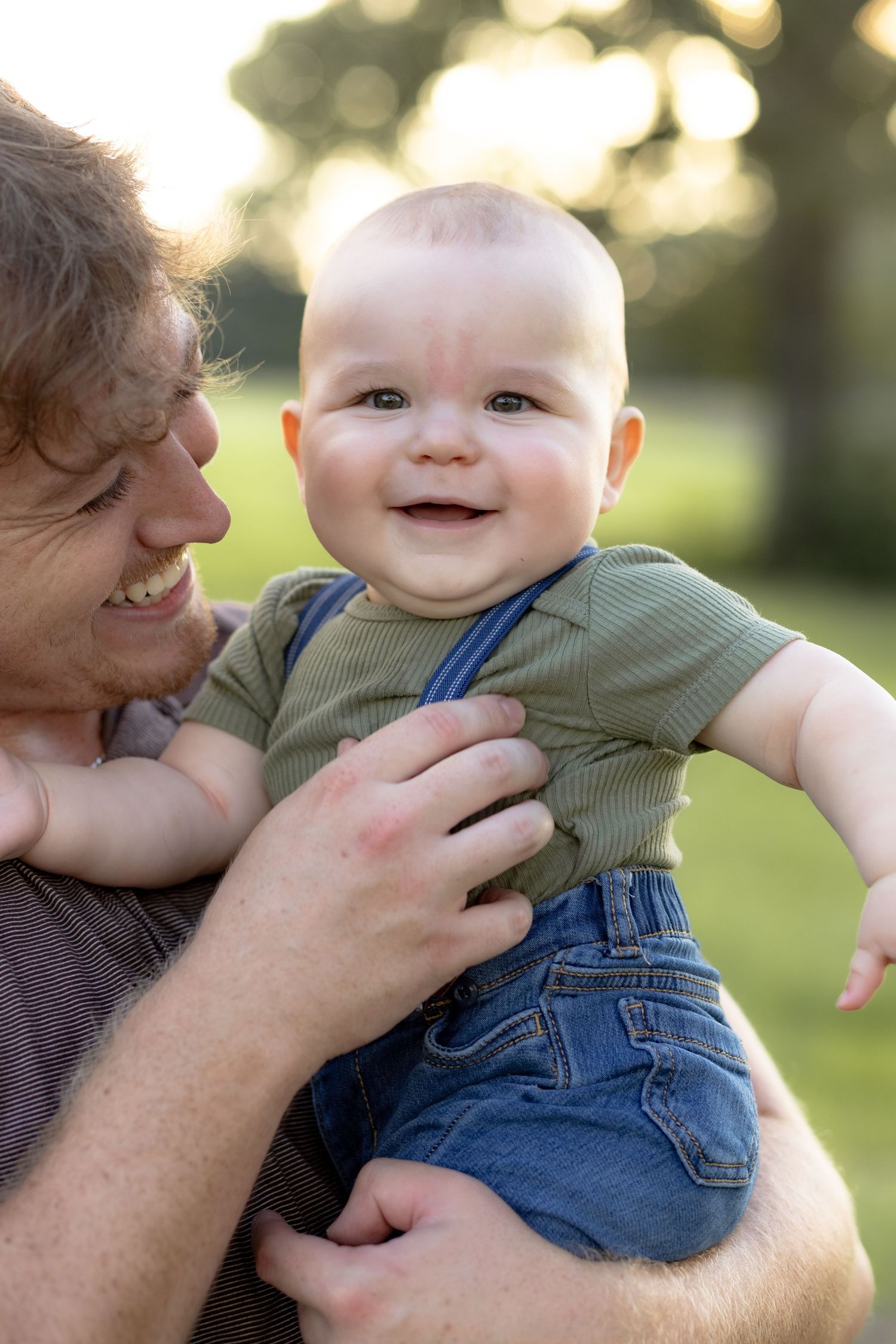 Family Pictures in a grass field at sunset near Dothan, Alabama
