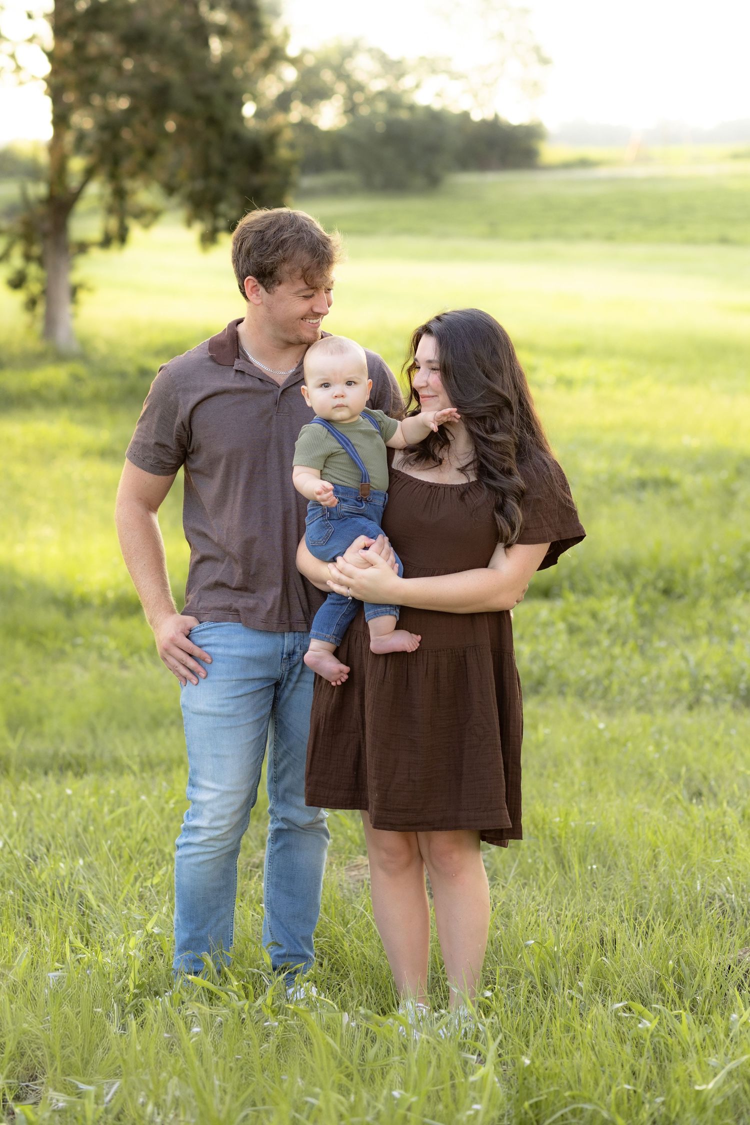 Family Pictures in a grass field at sunset near Dothan, Alabama