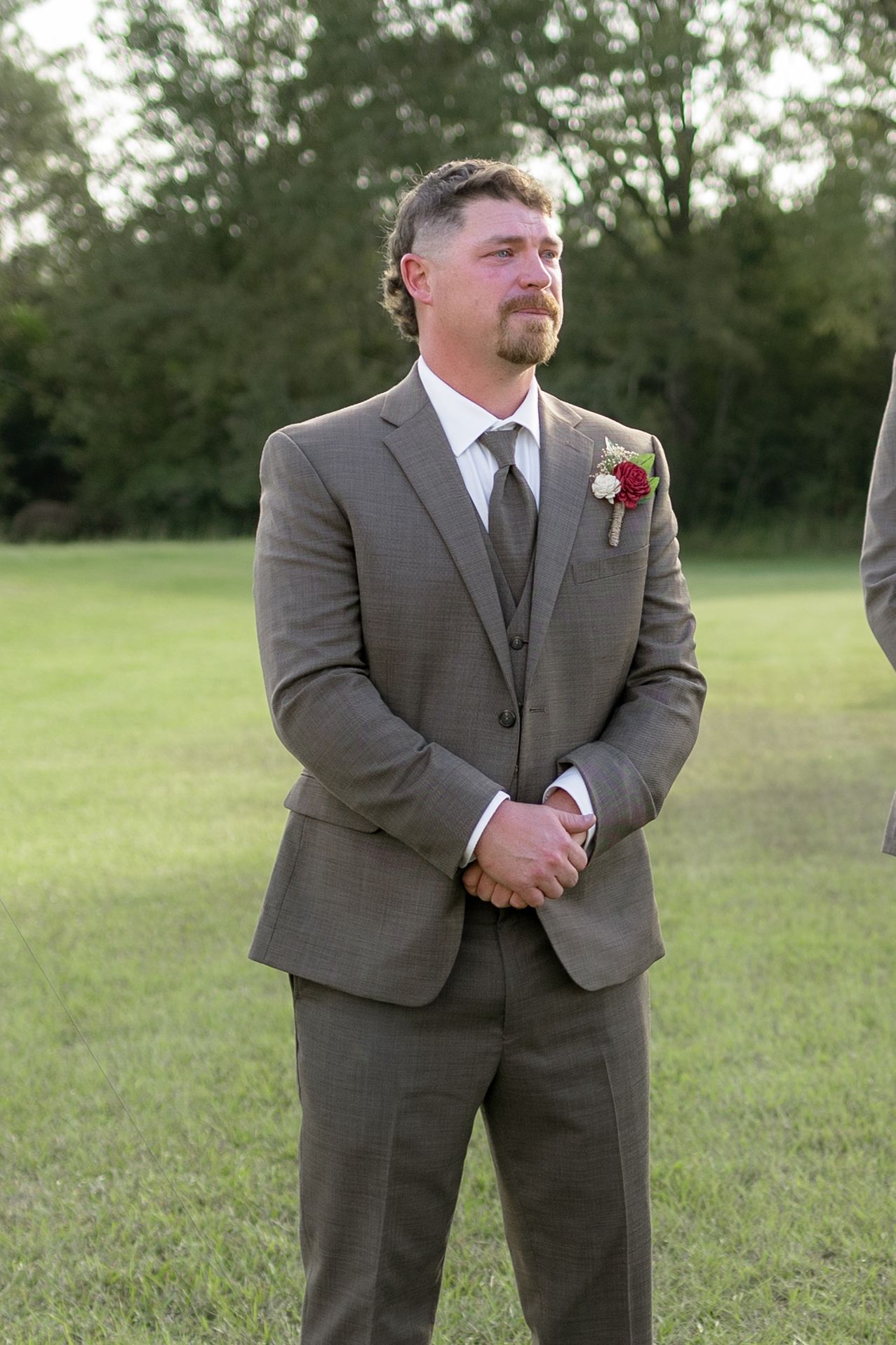 Groom crying at a wedding at Hilltop Acres Wicksburg, Alabama