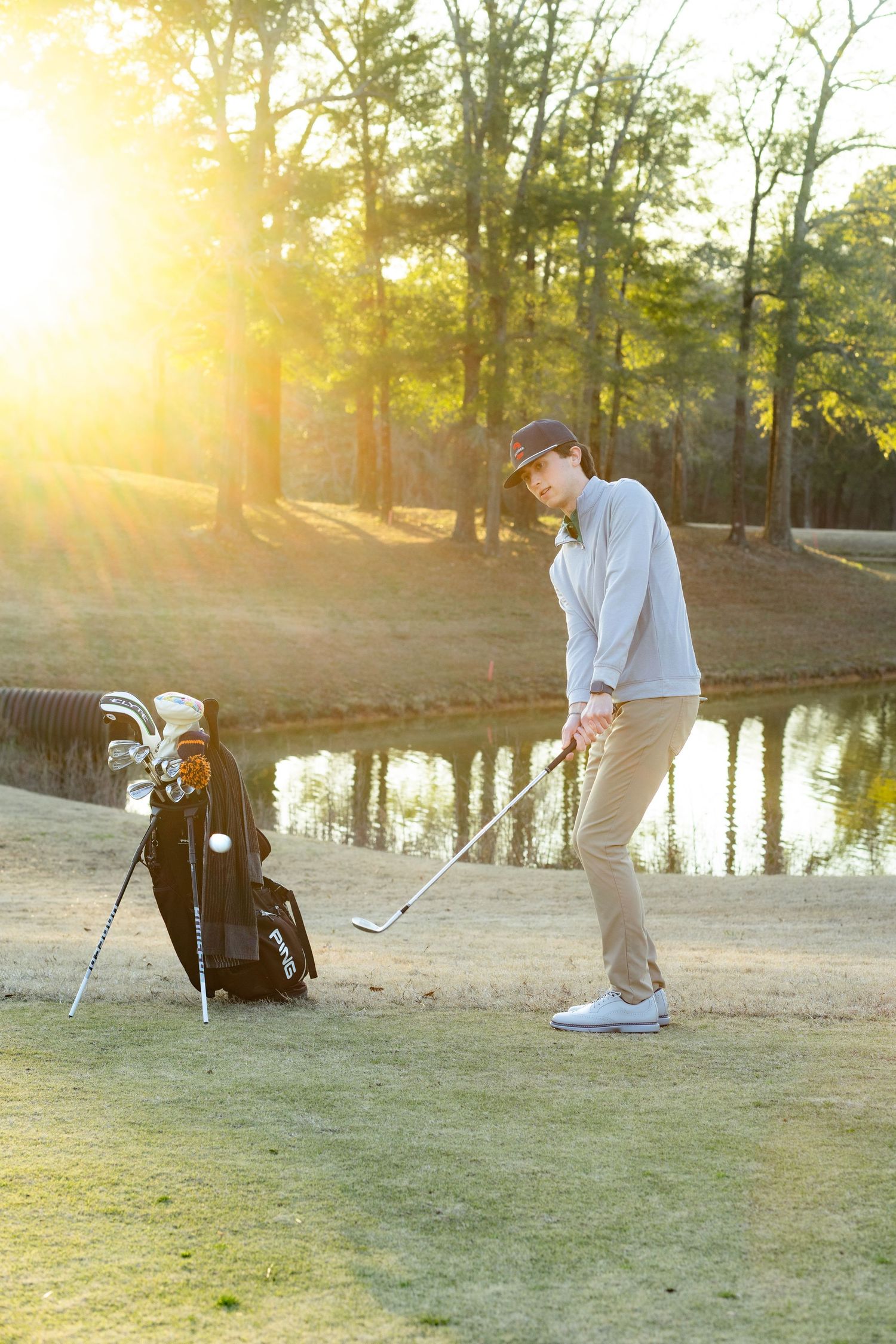 Senior playing golf on a golf course in Enterprise, Alabama