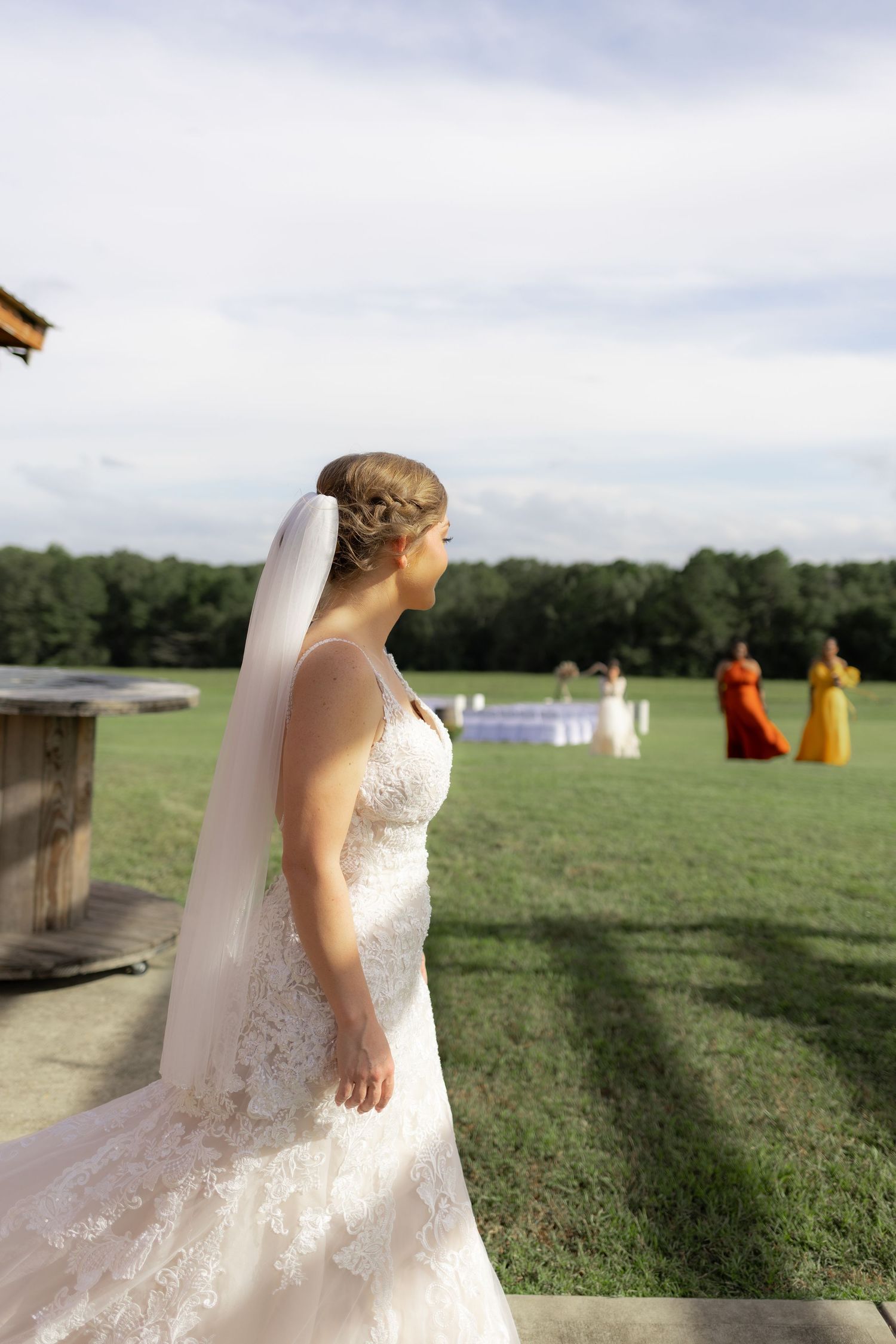 Sons' first look with bride underneath the gazebo at Hilltop Acres Wicksburg, Alabama