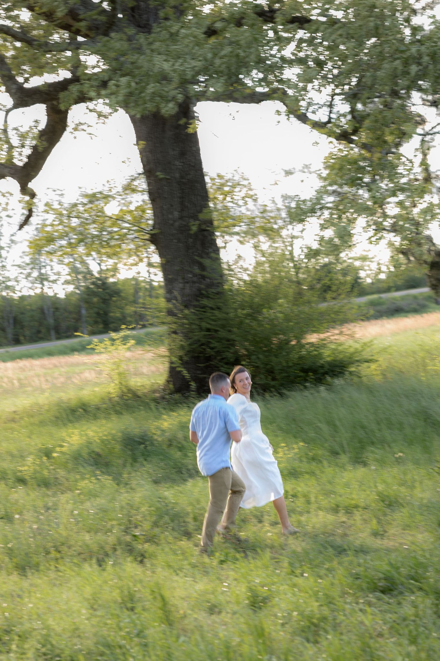 Storytelling romantic couple photos in a tall grass field at sunset in Dothan, Alabama