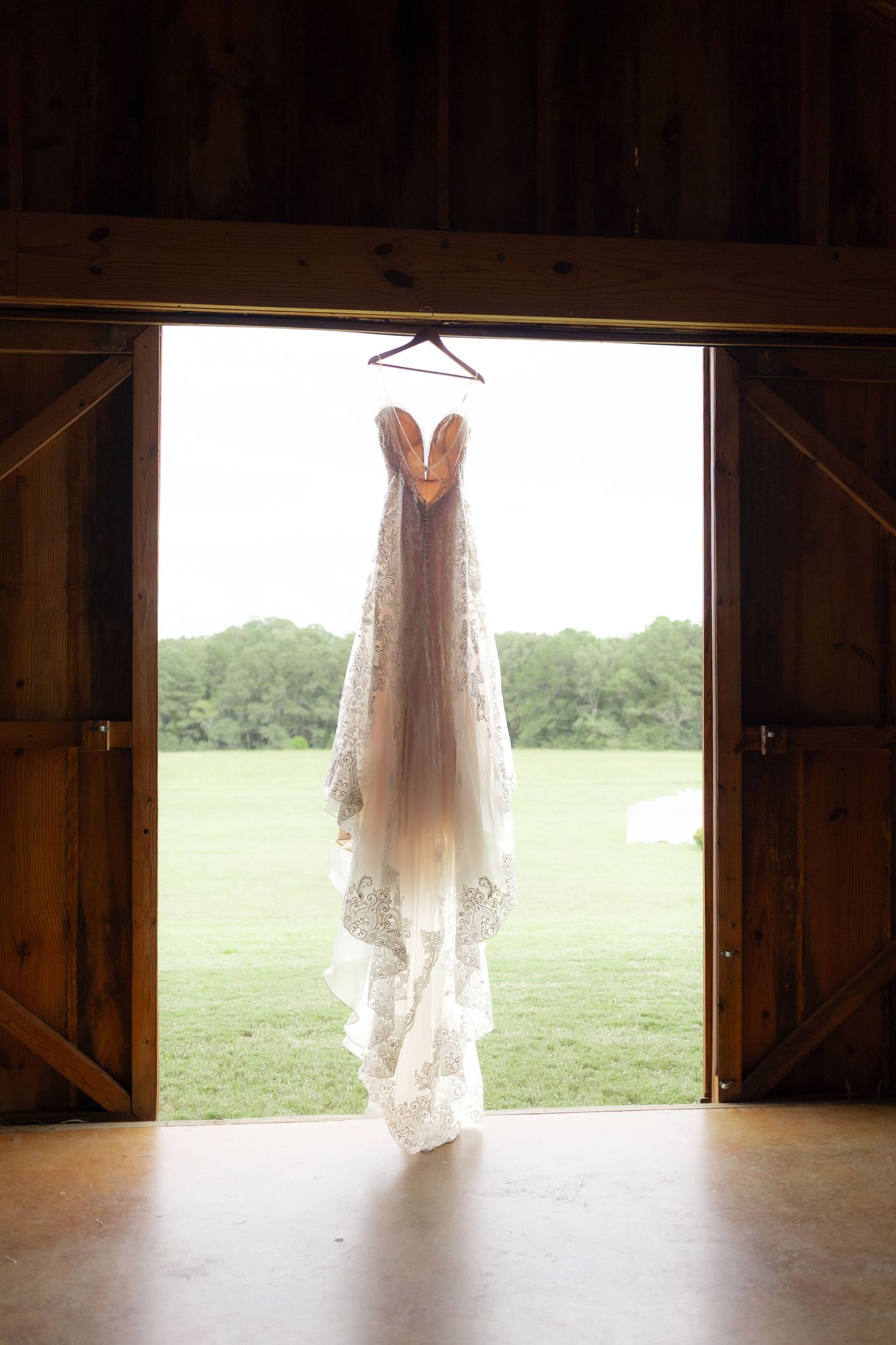 Wedding dress detail photos at a wedding at Hilltop Acres Wicksburg, Alabama
