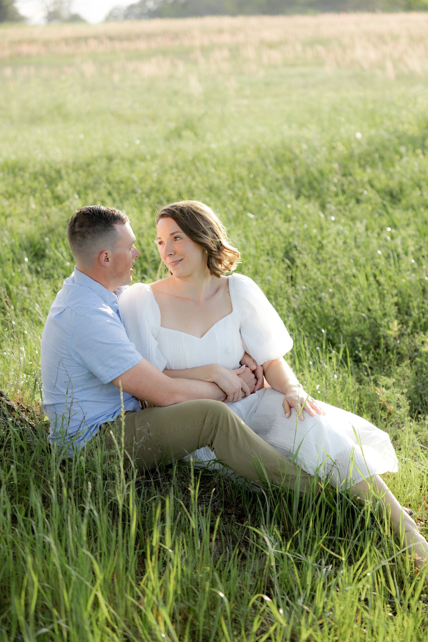 Storytelling romantic couple photos in a tall grass field at sunset in Dothan, Alabama