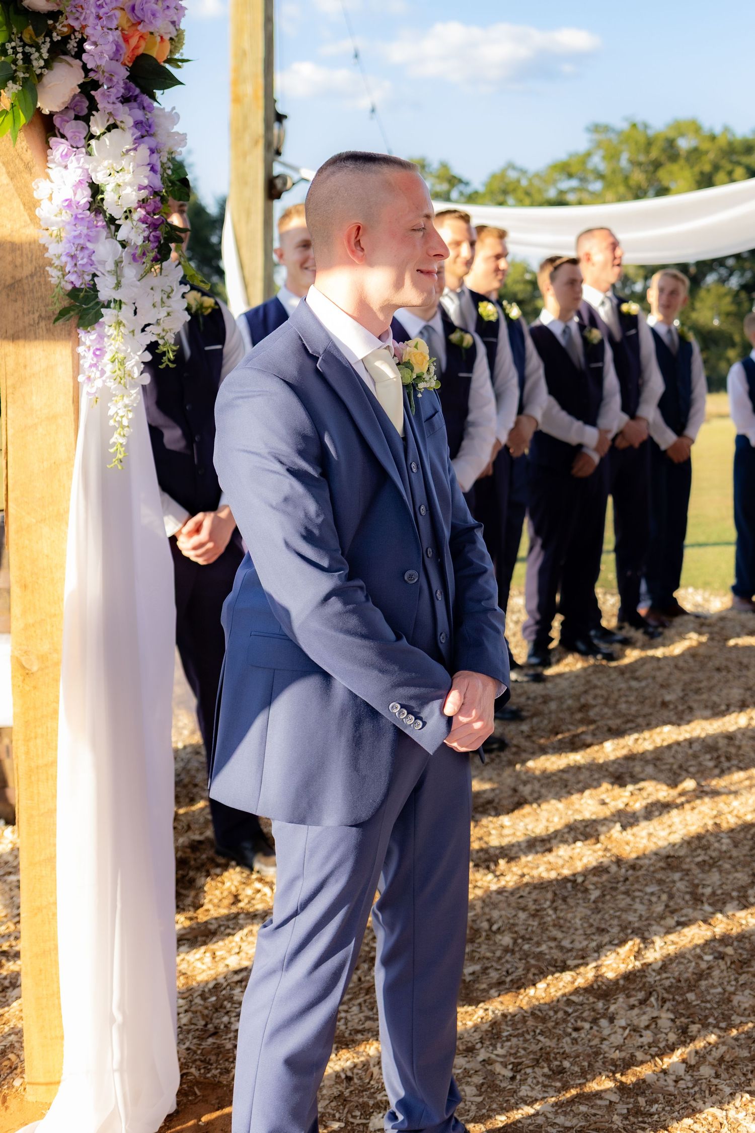 Groom standing at the end of the aisle at Dalrymple Farms Enterprise, Alabama