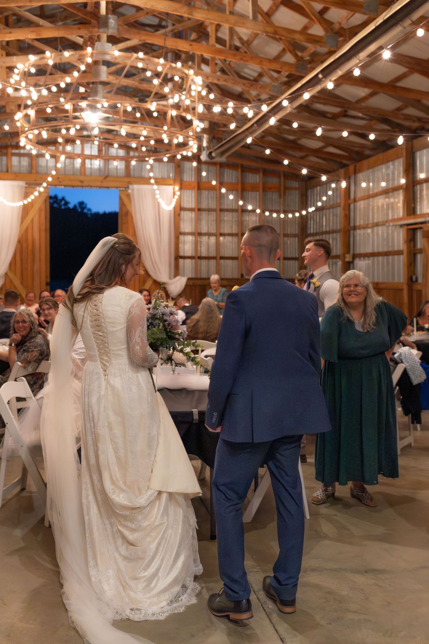 Bride and groom entering wedding reception at Dalrymple Farms Enterprise, Alabama