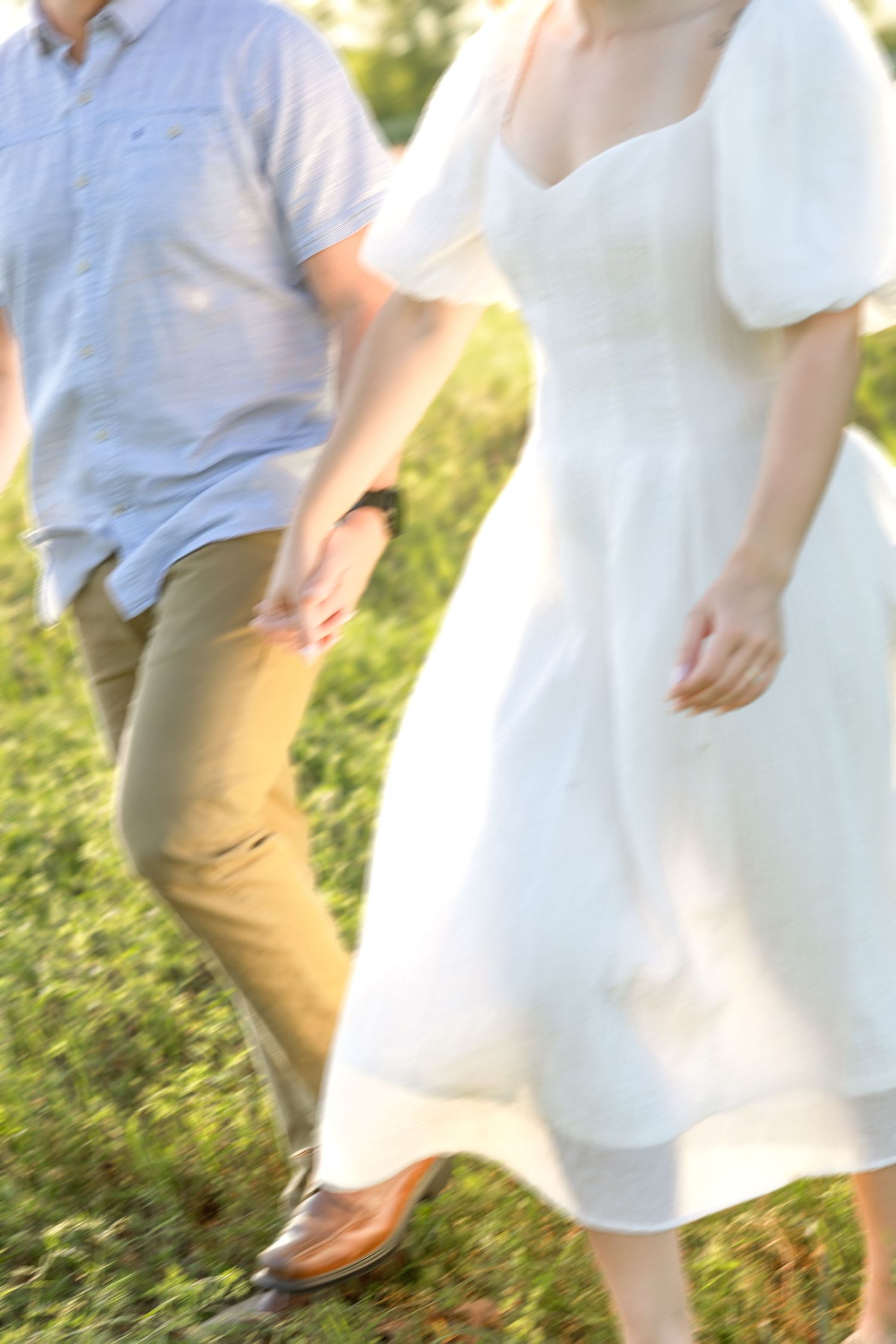 Storytelling couple photos in a tall grass field at sunset in Dothan, Alabama
