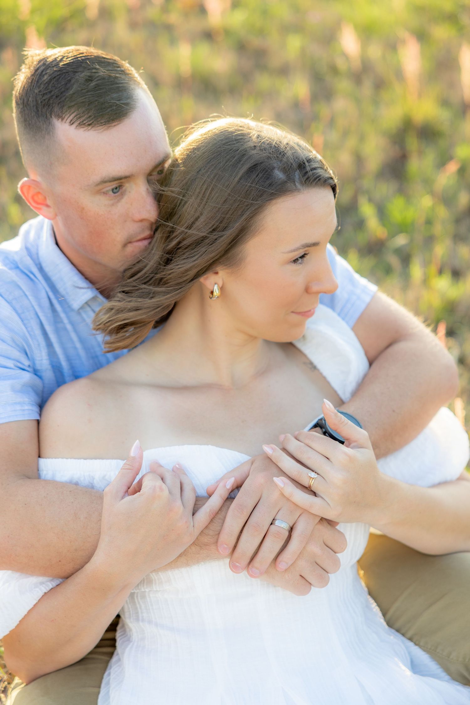 Storytelling couple photos in a tall grass field at sunset in Dothan, Alabama
