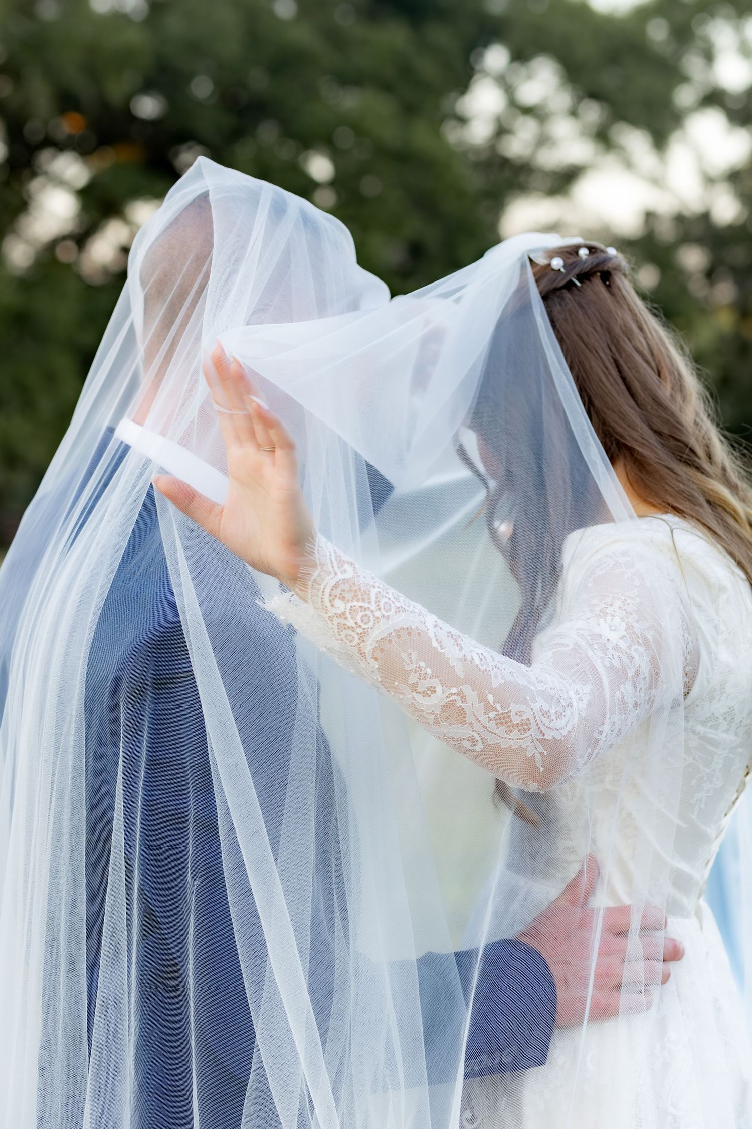 Bride and groom holding each other for portraits at Dalrymple Farms Enterprise, Alabama