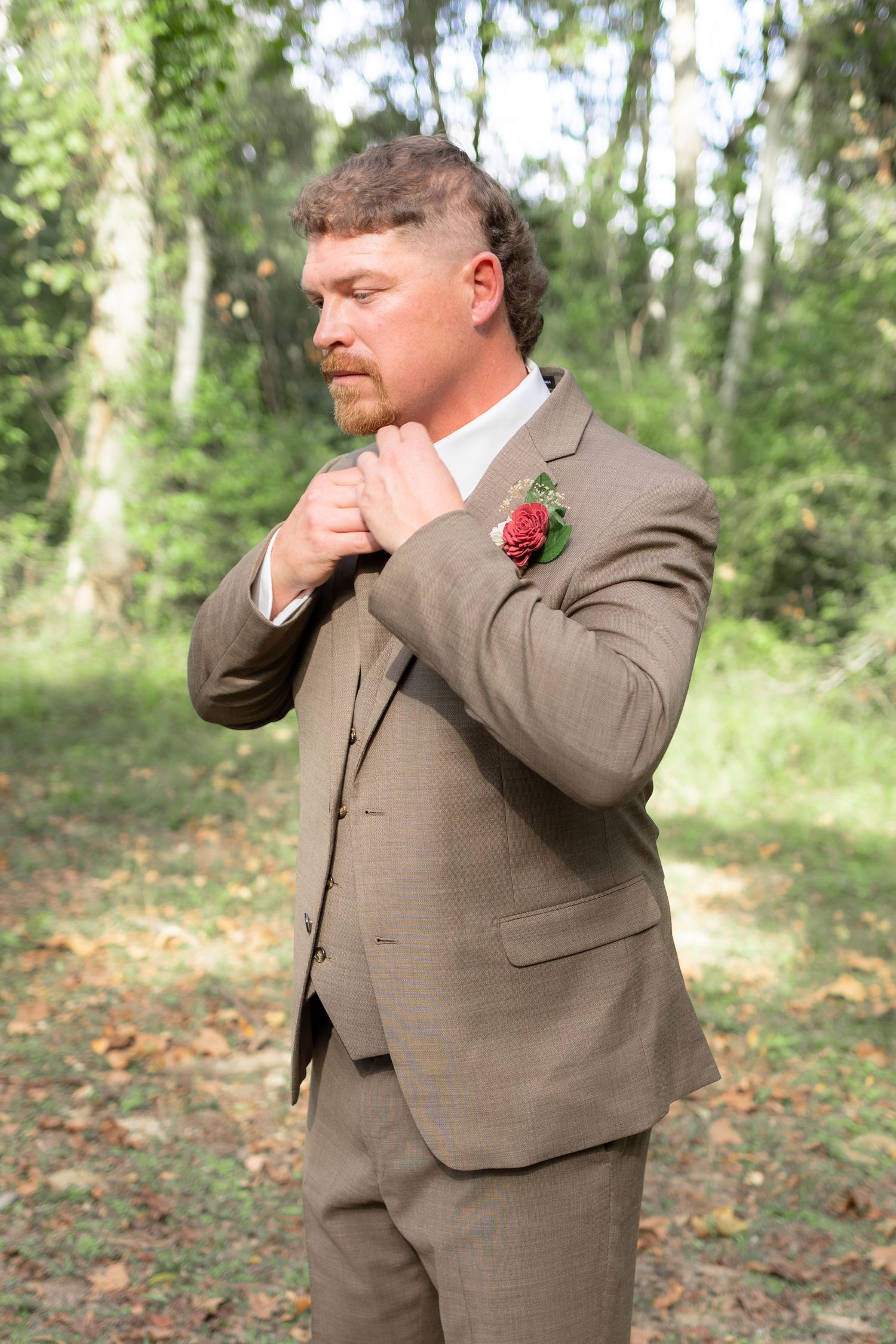 Groom getting ready for his wedding at Hilltop Acres Wicksburg, Alabama